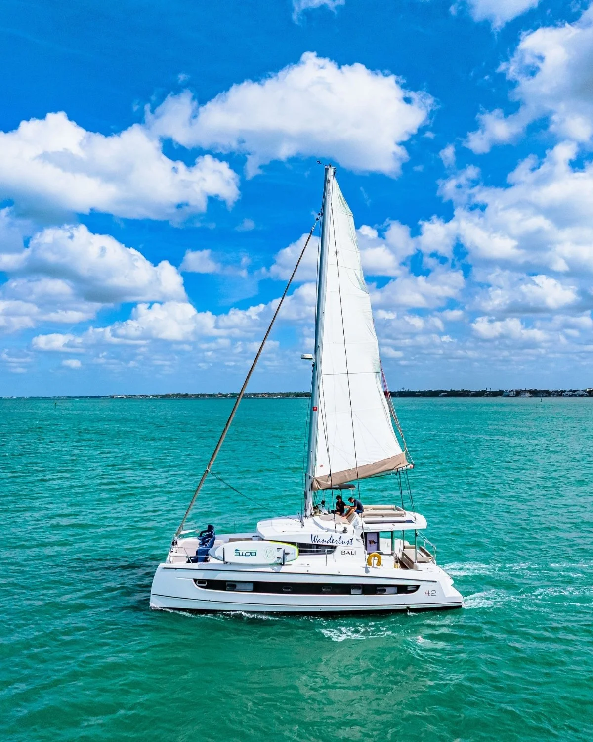 Catamaran and monohull sailing yachts