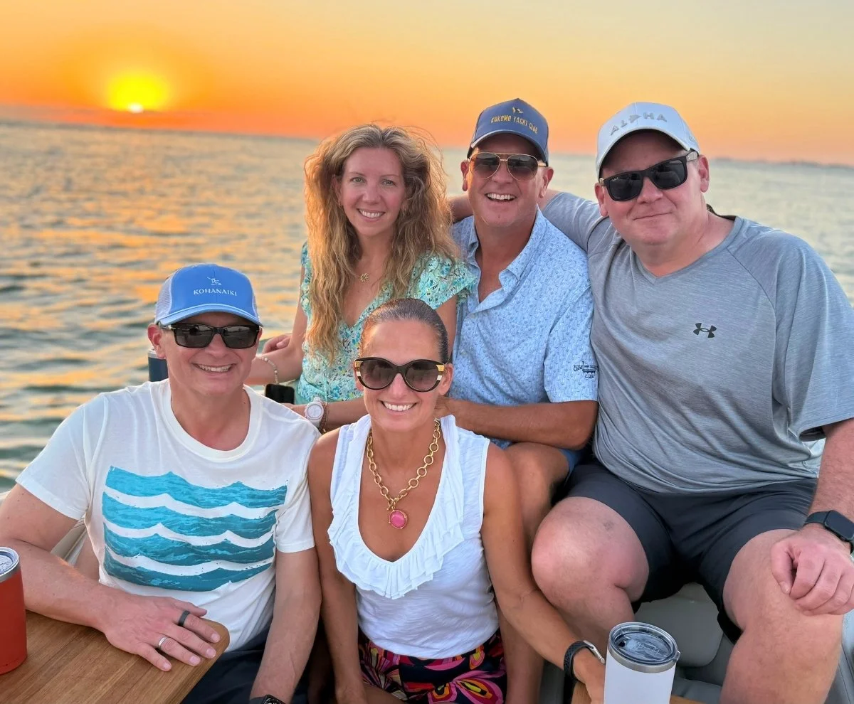 Family and friends sailing together