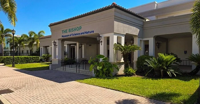 Sarasota Motor Club - Exotic Car Rental Sarasota Florida - Exterior of the Bishop Museum of Science and Nature with clear sunny weather.