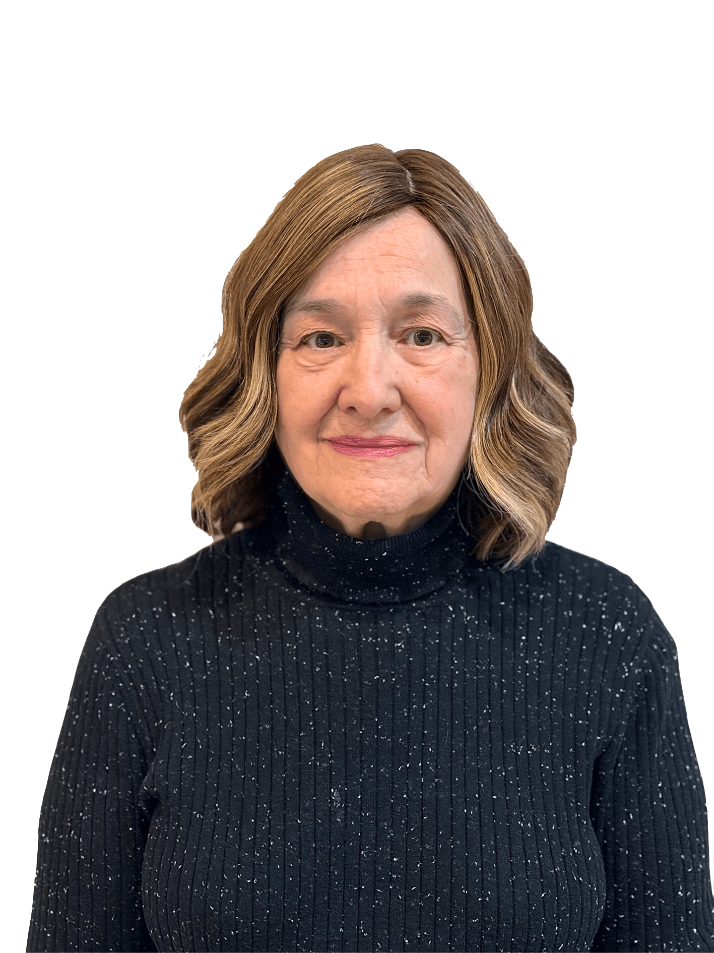 An older woman with shoulder length blond hair, wearing a green button down shirt and slightly smiling at the camera.