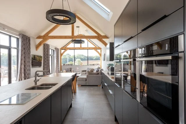 conversion & re-modelling of an existing grade II listed barn kitchen lounge