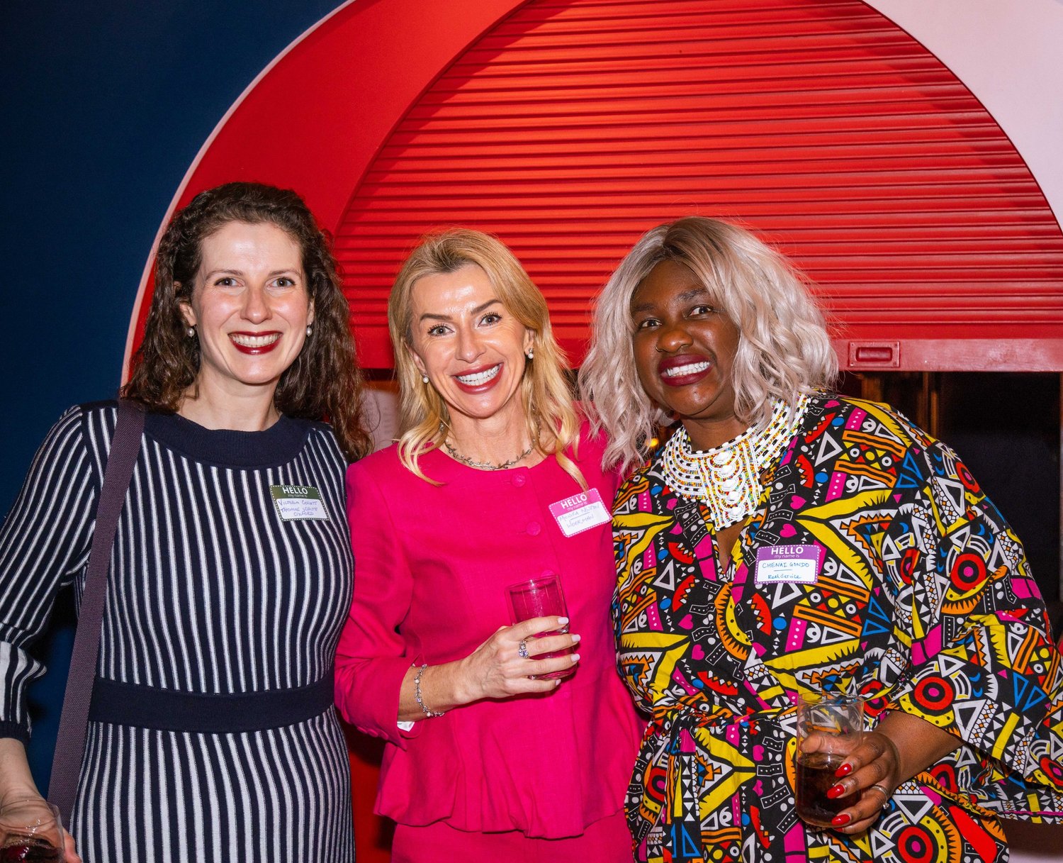 Three Experience Makers attendees together at an event