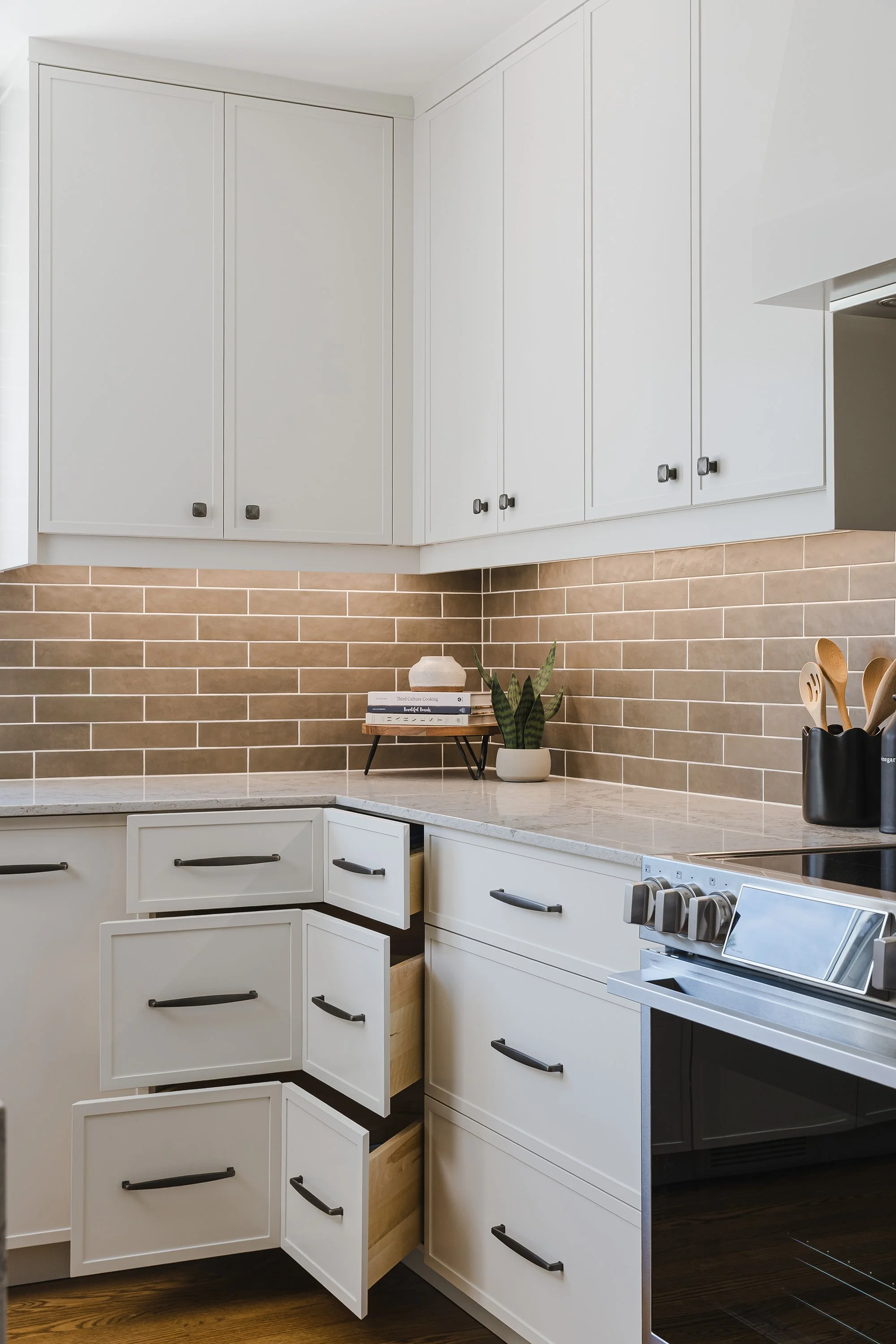 Custom kitchen design for an Ottawa family home featuring corner drawers.