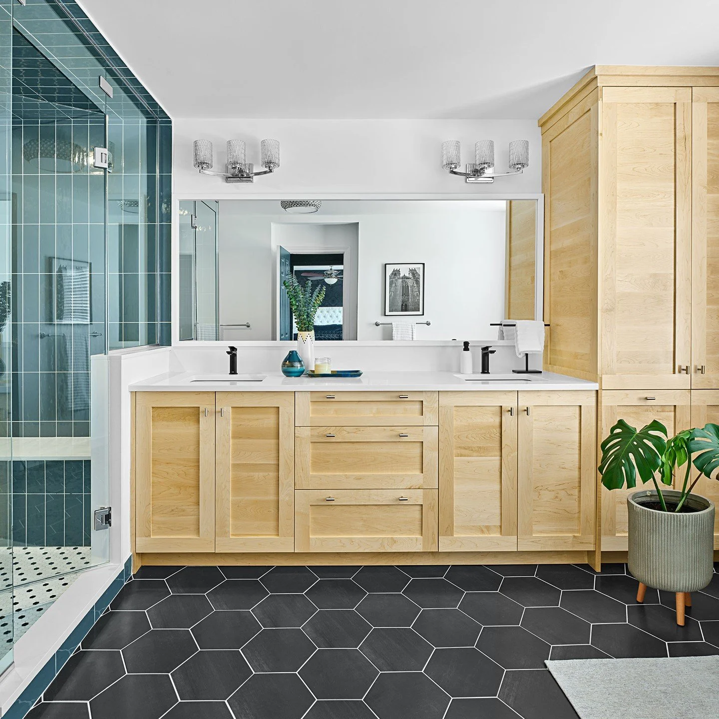 Colour can completely transform how you feel in your home. ⁠

As you can see, these clients were very comfortable with colour. 

We found a tile that matched the striking teal tone they used in their walk-in closet. By repeating this colour we create