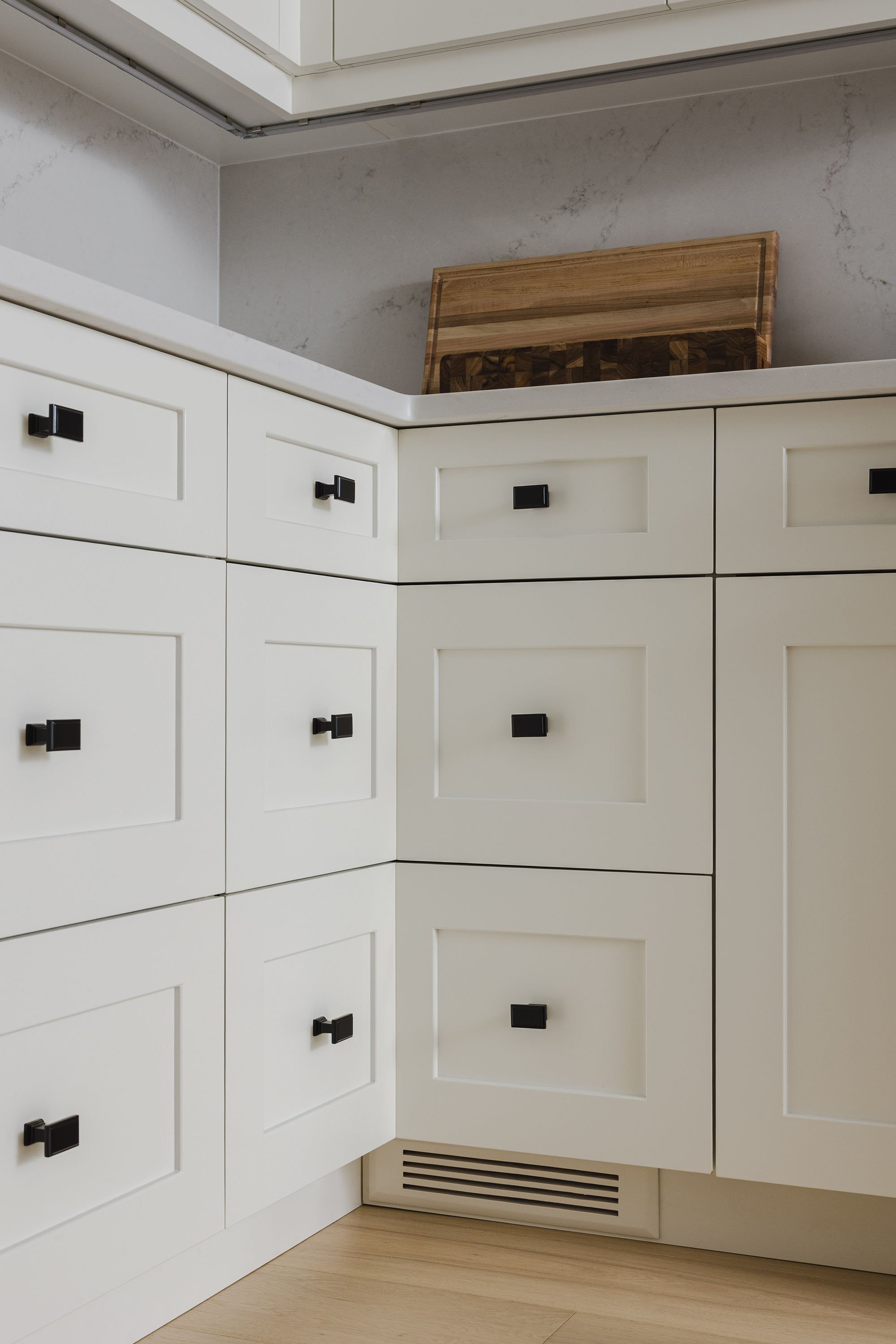 Kitchen renovation in Ottawa featuring white oak flooring and corner drawers.