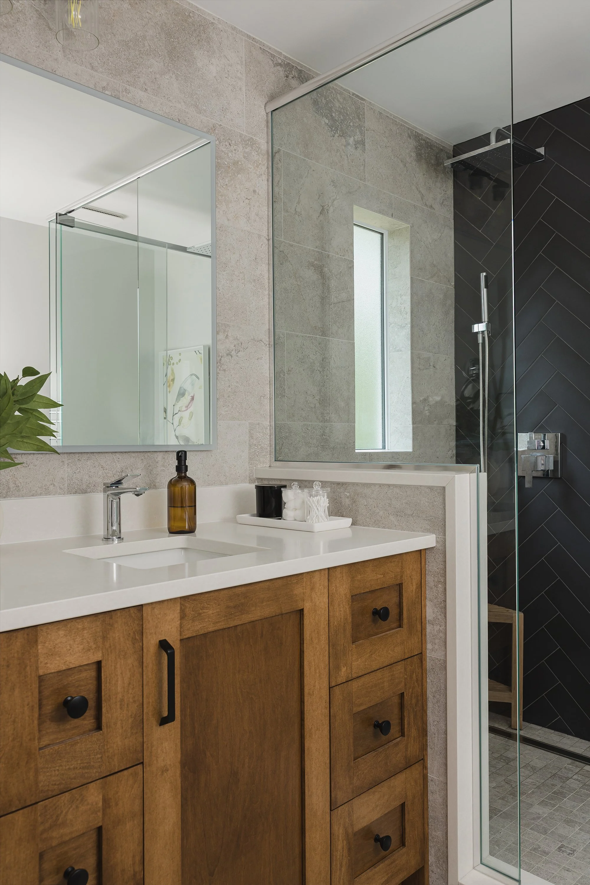 Ensuite renovation in Ottawa featuring a maple vanity with lots of drawers and an LED mirror. 