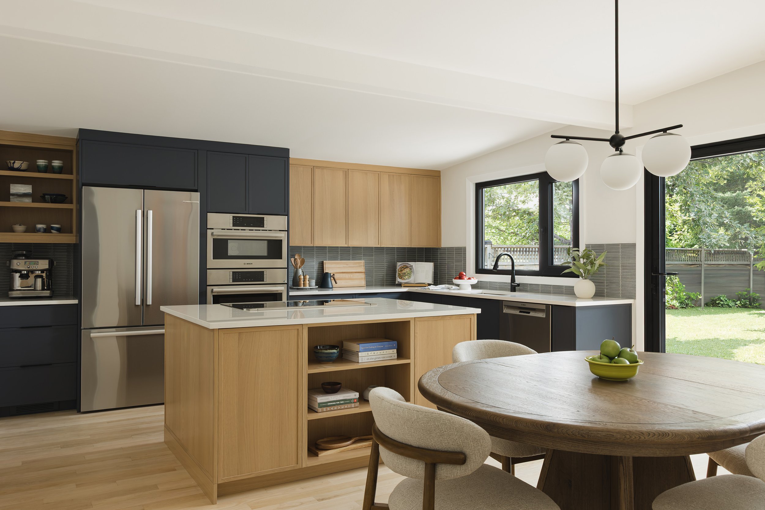 Ottawa interior design featuring a mid-century modern kitchen with white oak cabinetry.