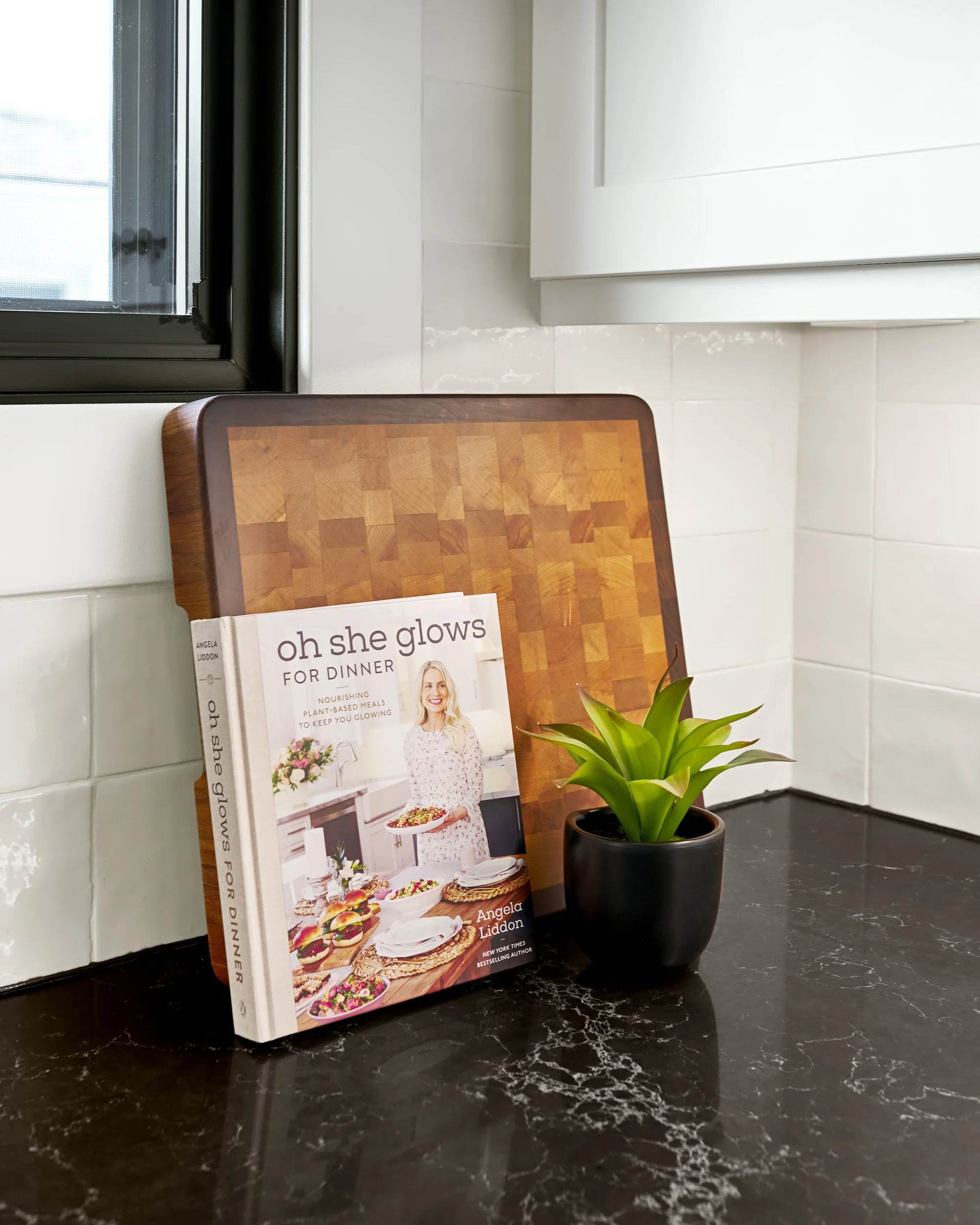 Custom craftsman style kitchen renovation in Ottawa featuring rich black quartz counters. 