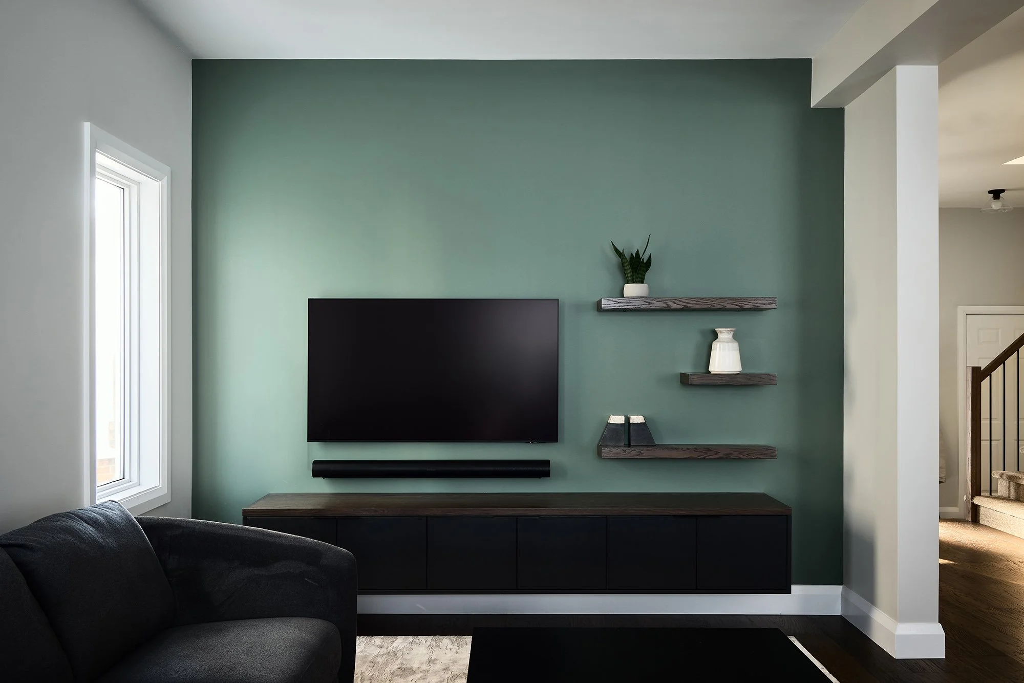 Main floor renovation in Ottawa featuring a custom entertainment unit. 