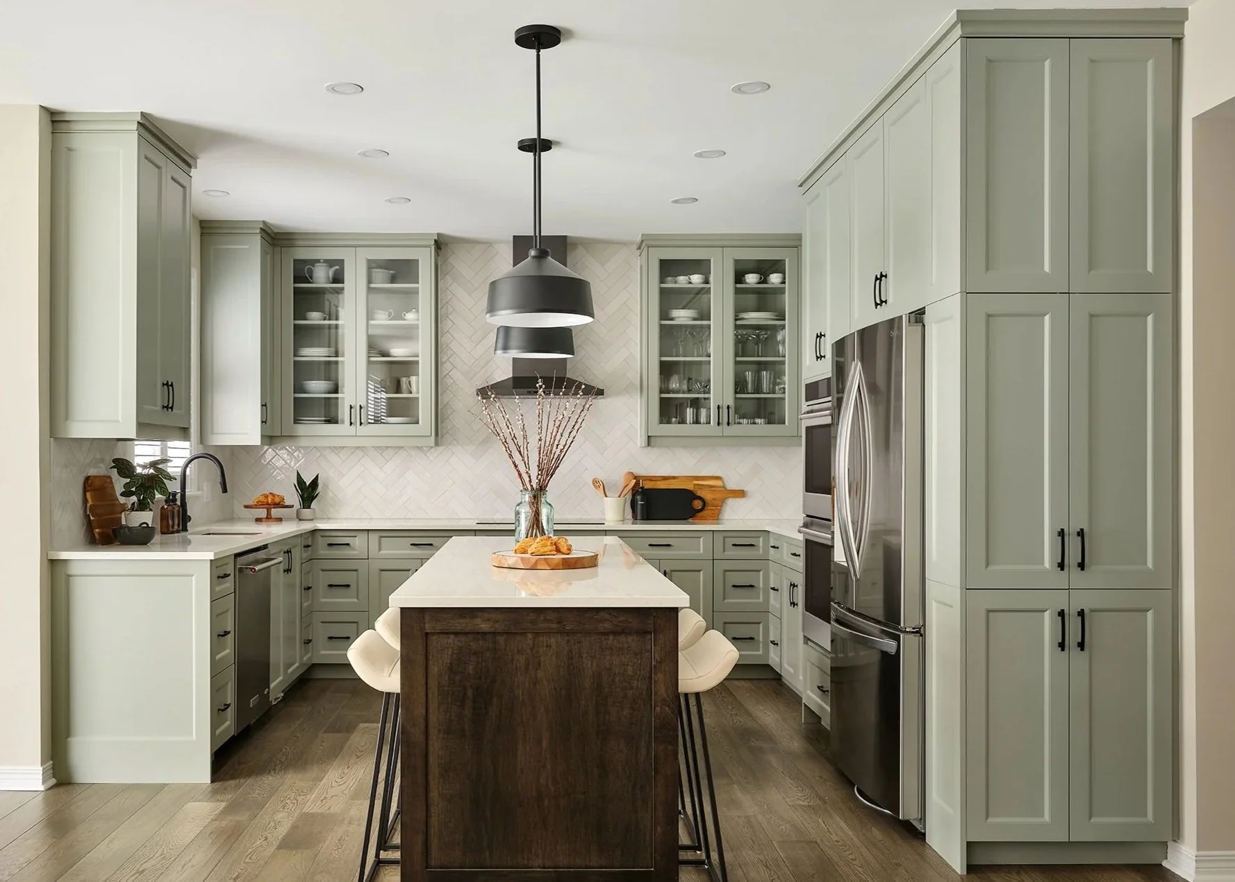 Ottawa kitchen renovation featuring sage green custom cabinets