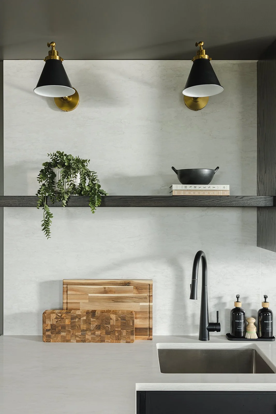 CPI Interiors Ottawa kitchen design with floating shelves and sconces