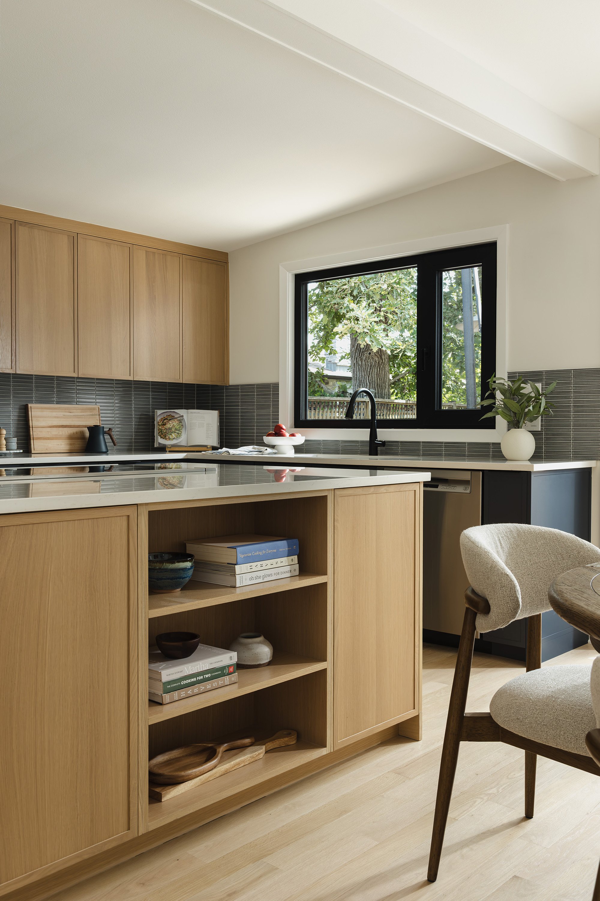 Ottawa interior design featuring a mid-century modern kitchen with a white oak island.