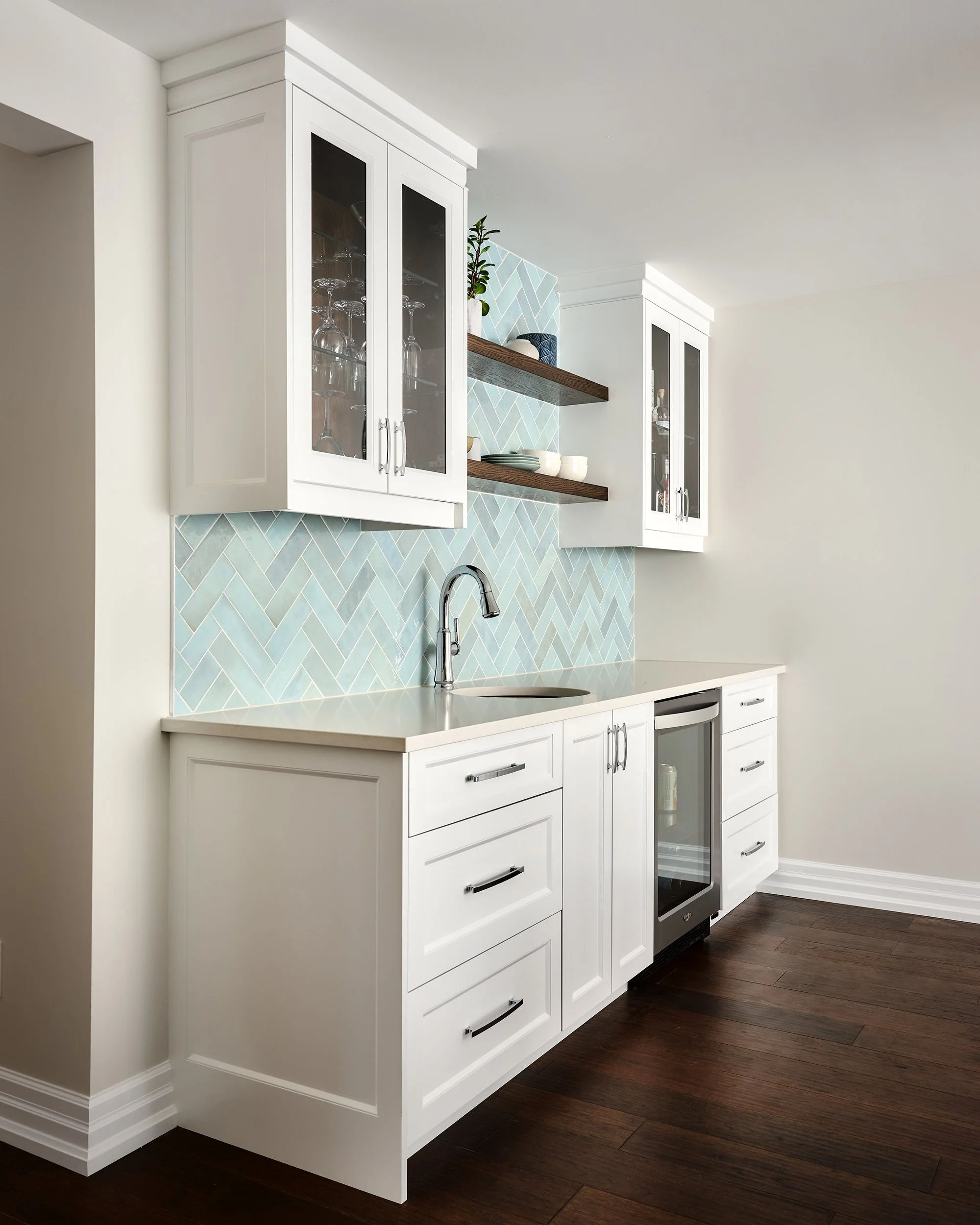 Custom kitchen design for an Ottawa family home featuring a built-in bar.