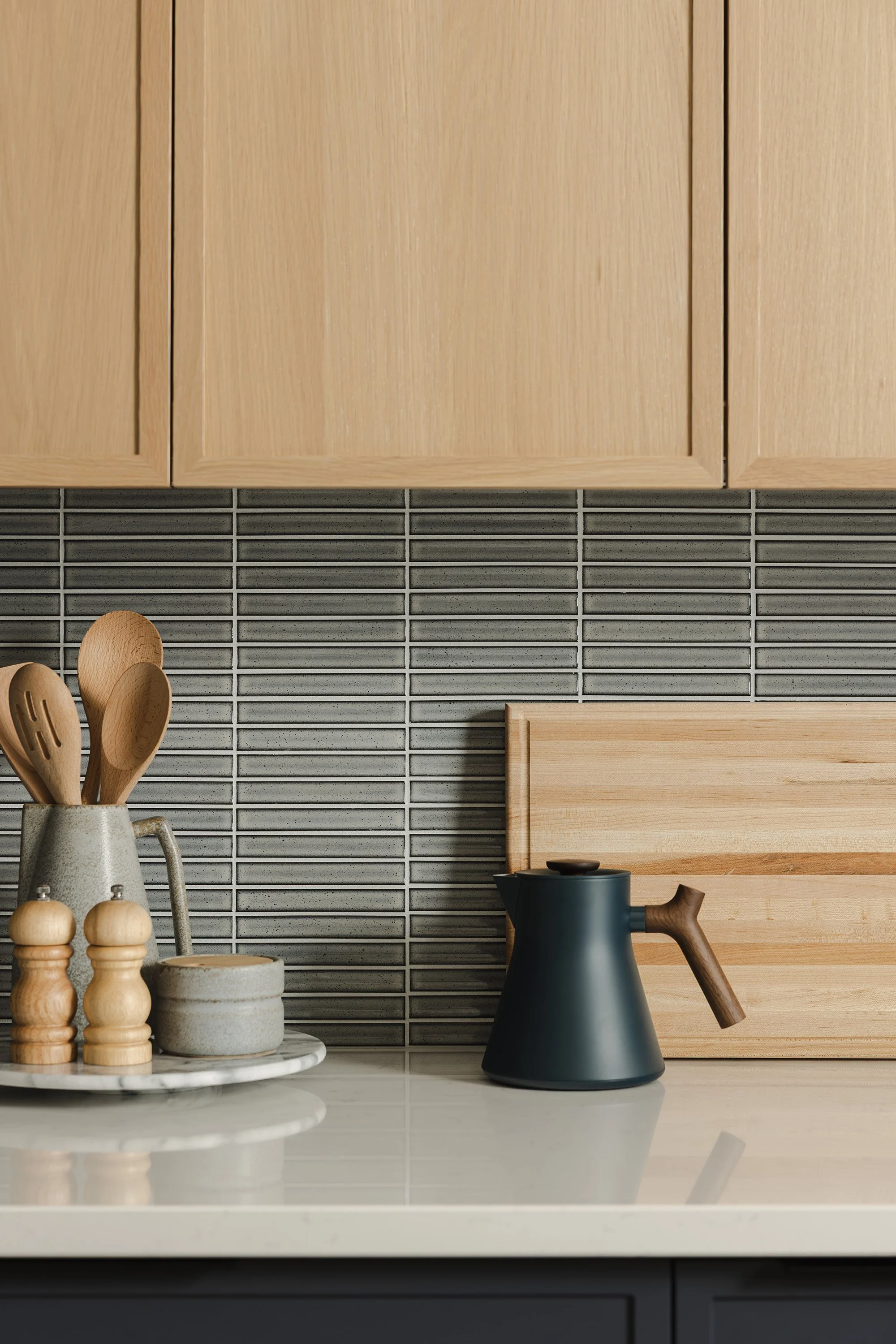 Ottawa interior design featuring a linear mosaic backplash.