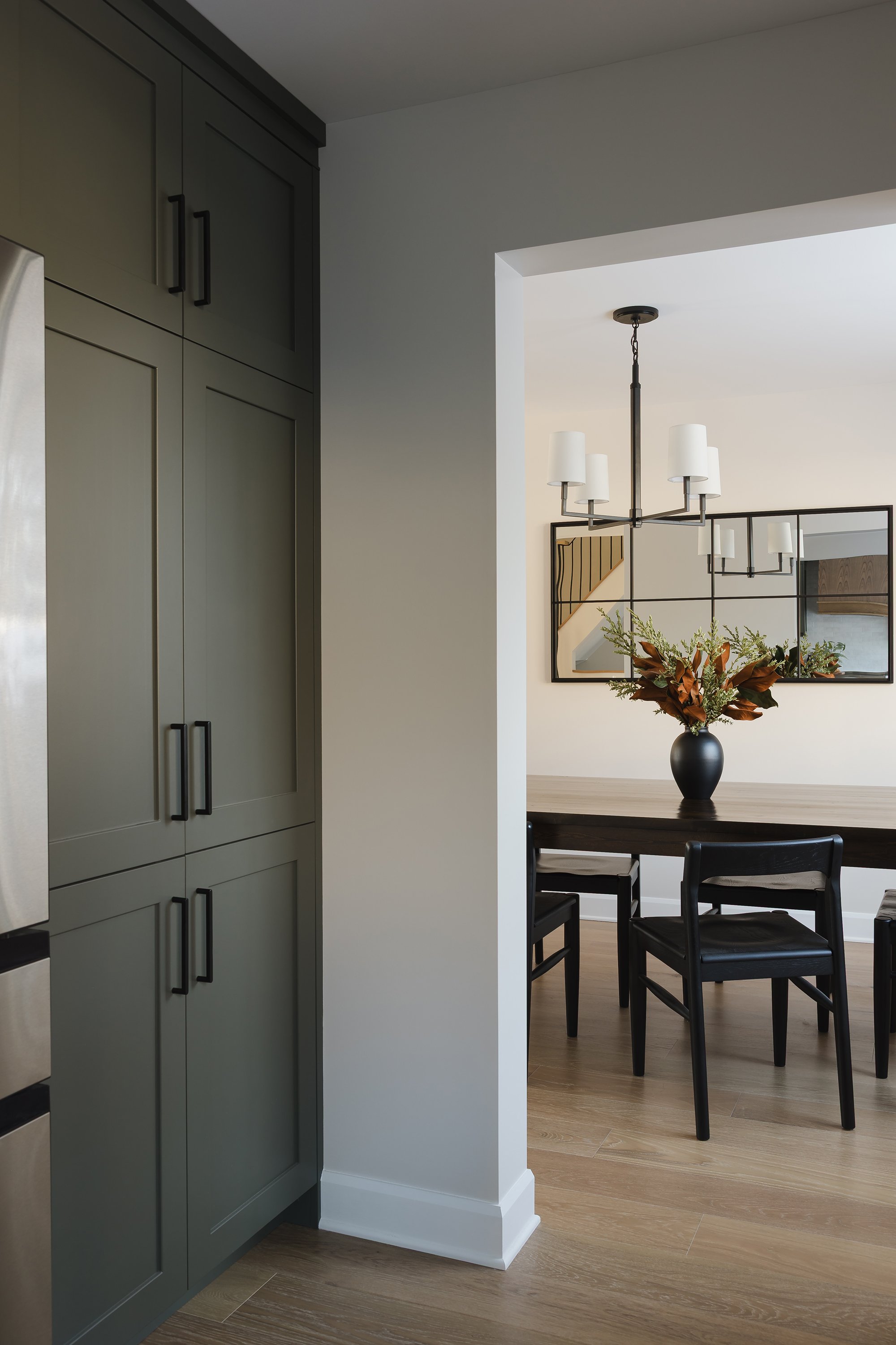 Custom kitchen renovation in Ottawa featuring green shaker cabinets and a warm farmhouse feel. 