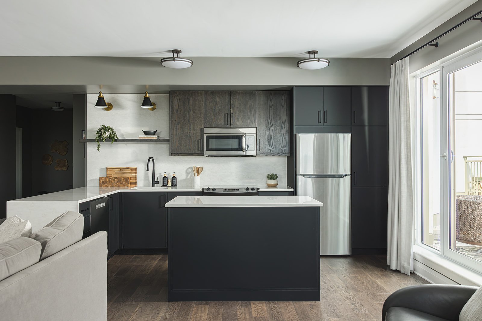 CPI Interiors Ottawa kitchen design with black cabinets and an island