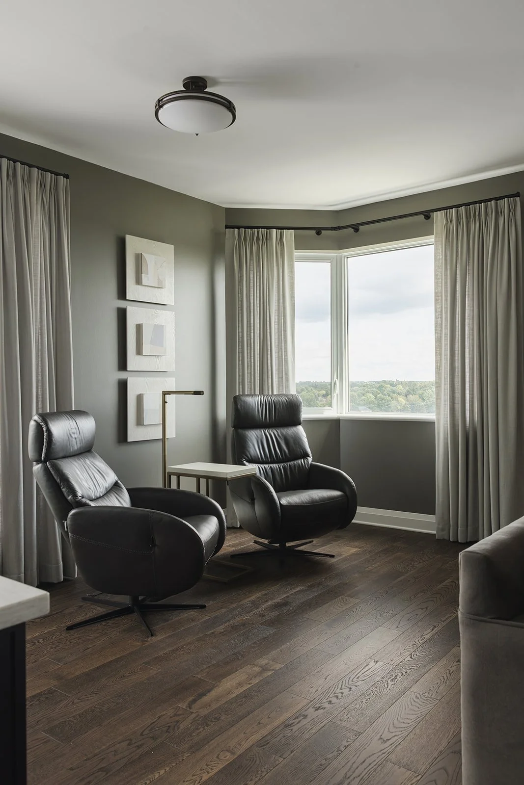 CPI Interiors luxury condo design with a cozy sitting area