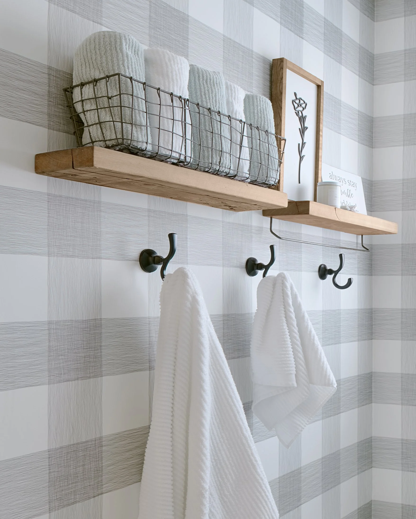 Ensuite bathroom renovation in Ottawa featuring custom grey vanity and farmhouse accessories. 