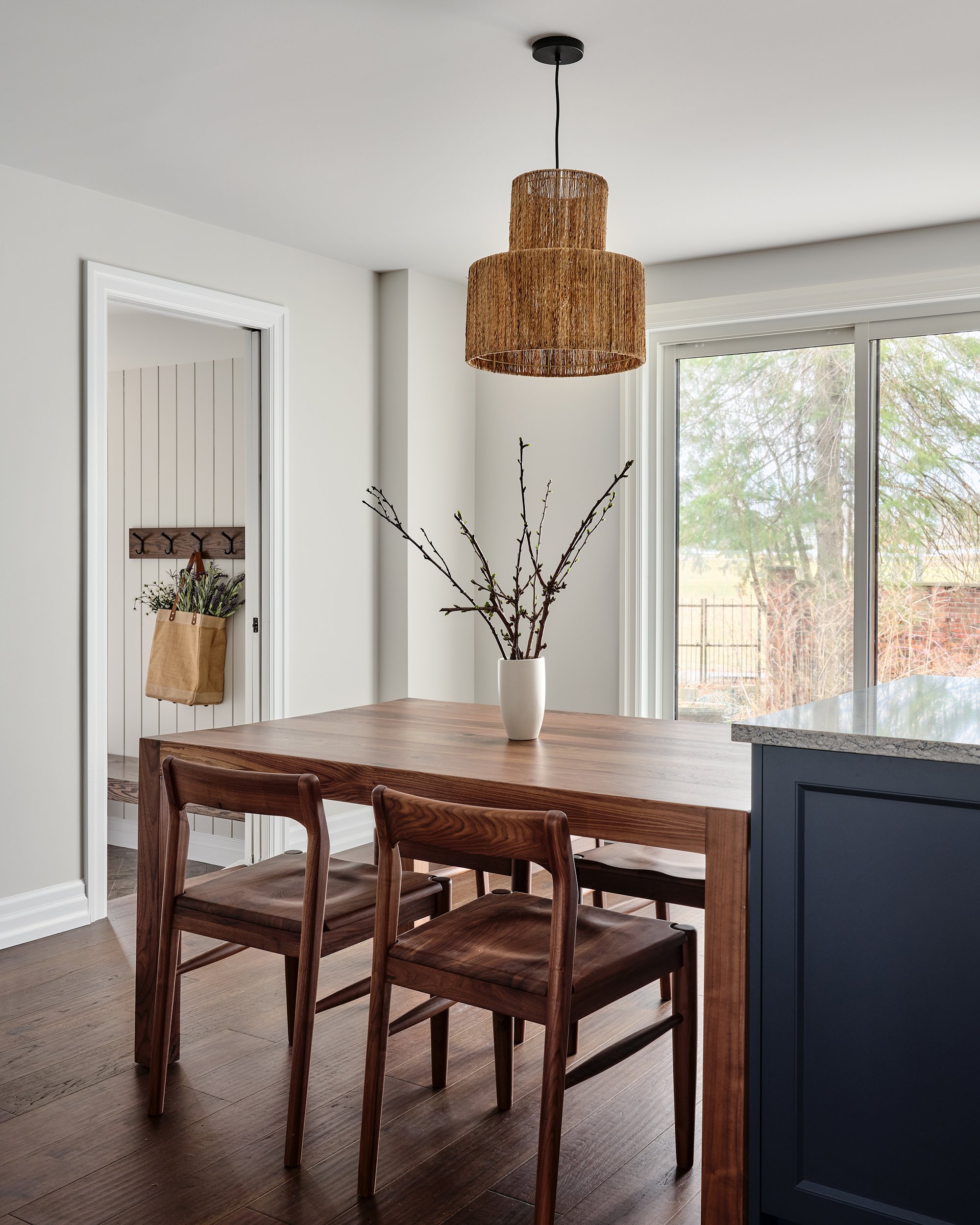 Custom kitchen design for an Ottawa family home featuring a custom walnut table.