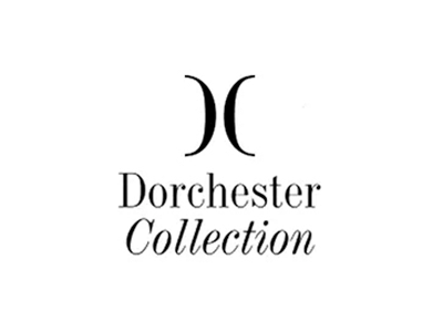 The Dorchester Collection logo with a stylized 'DC' and the words 'Dorchester Collection' underneath.