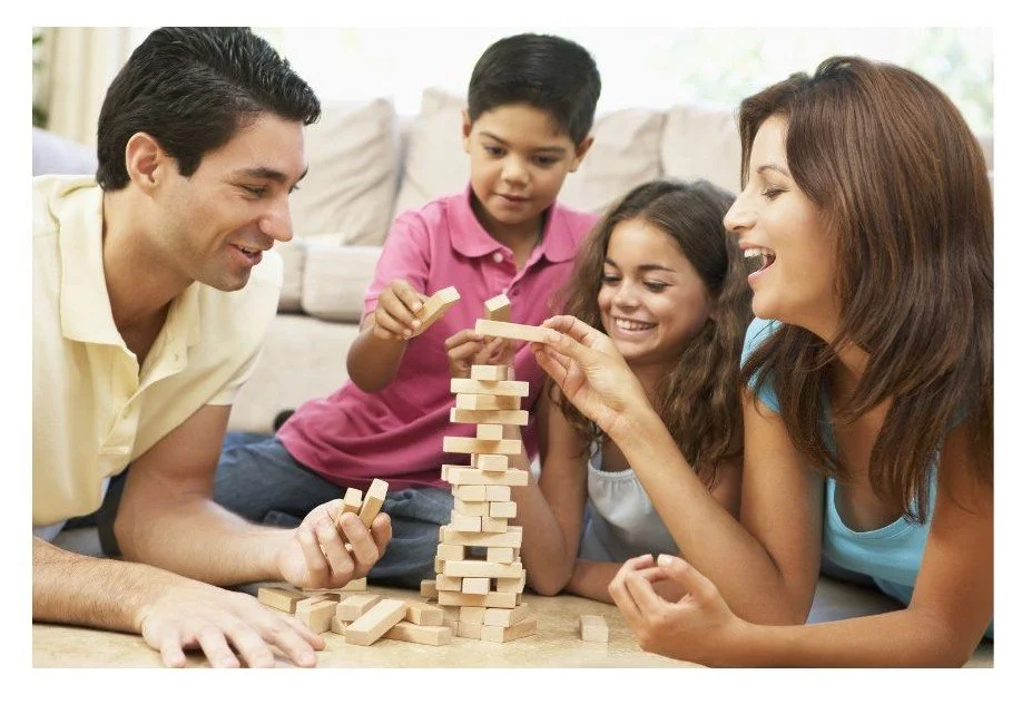 bilingual family playing games Spiral Roots LLC