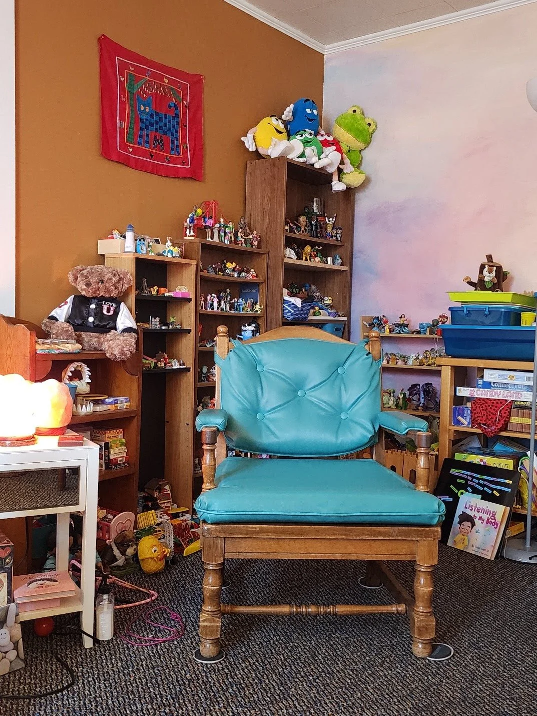 counseling offiec with sandtray, games, and expressive arts spiral roots llc