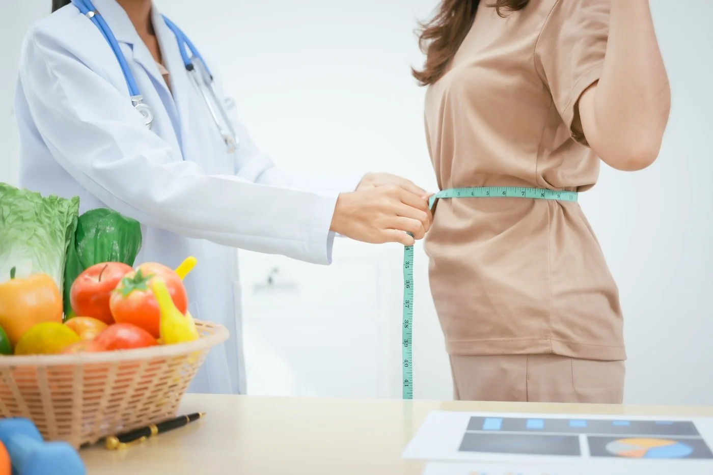 Provider measuring weight loss