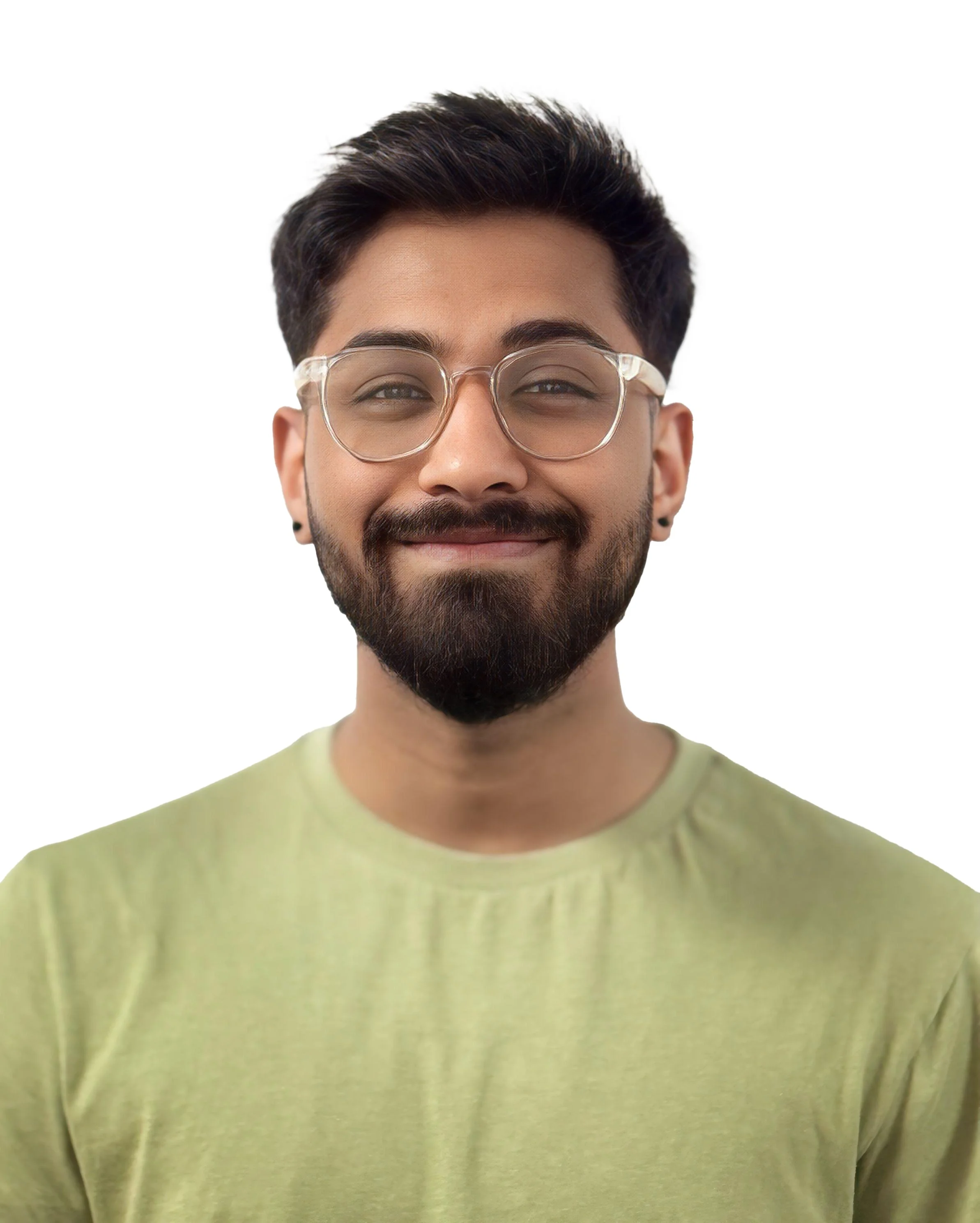 A smiling man with glasses, a beard, and dark hair wearing a light green shirt, against a white background.