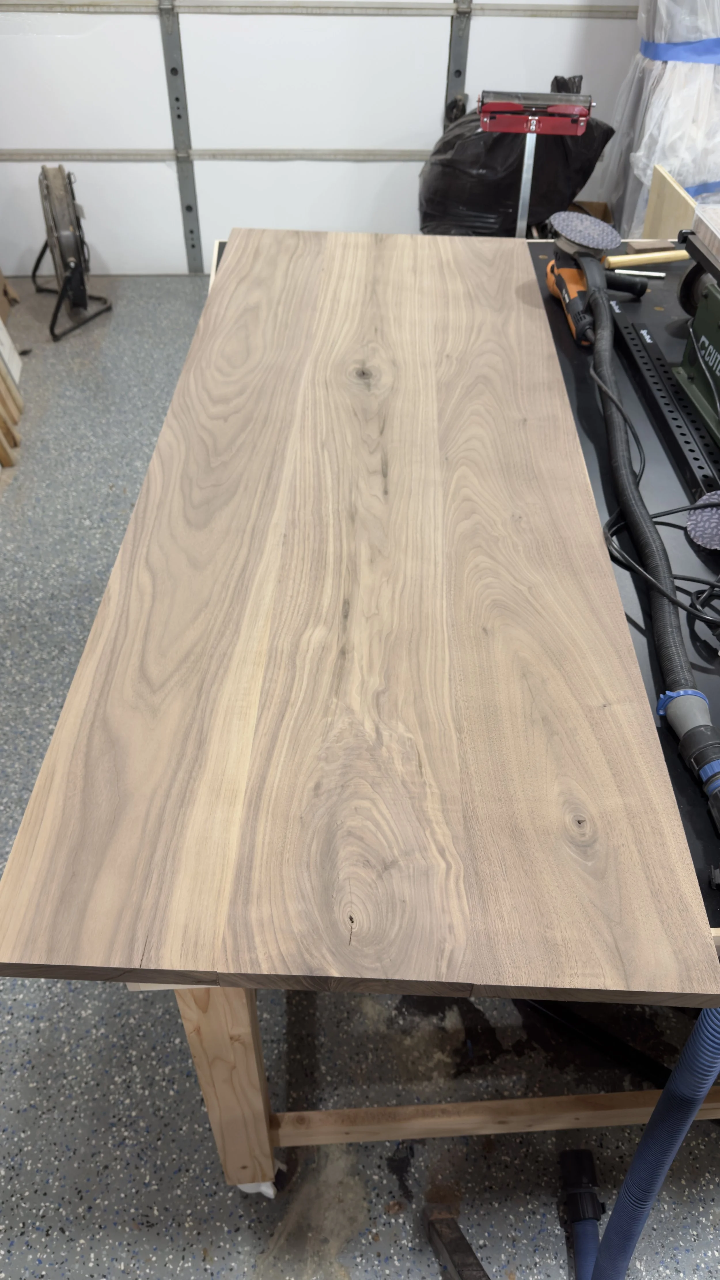 Sanded and surfaced solid walnut countertop panel