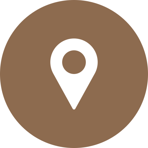 Ein braunes Icon mit einer weißen Kartenmarkierung (Location-Symbol).