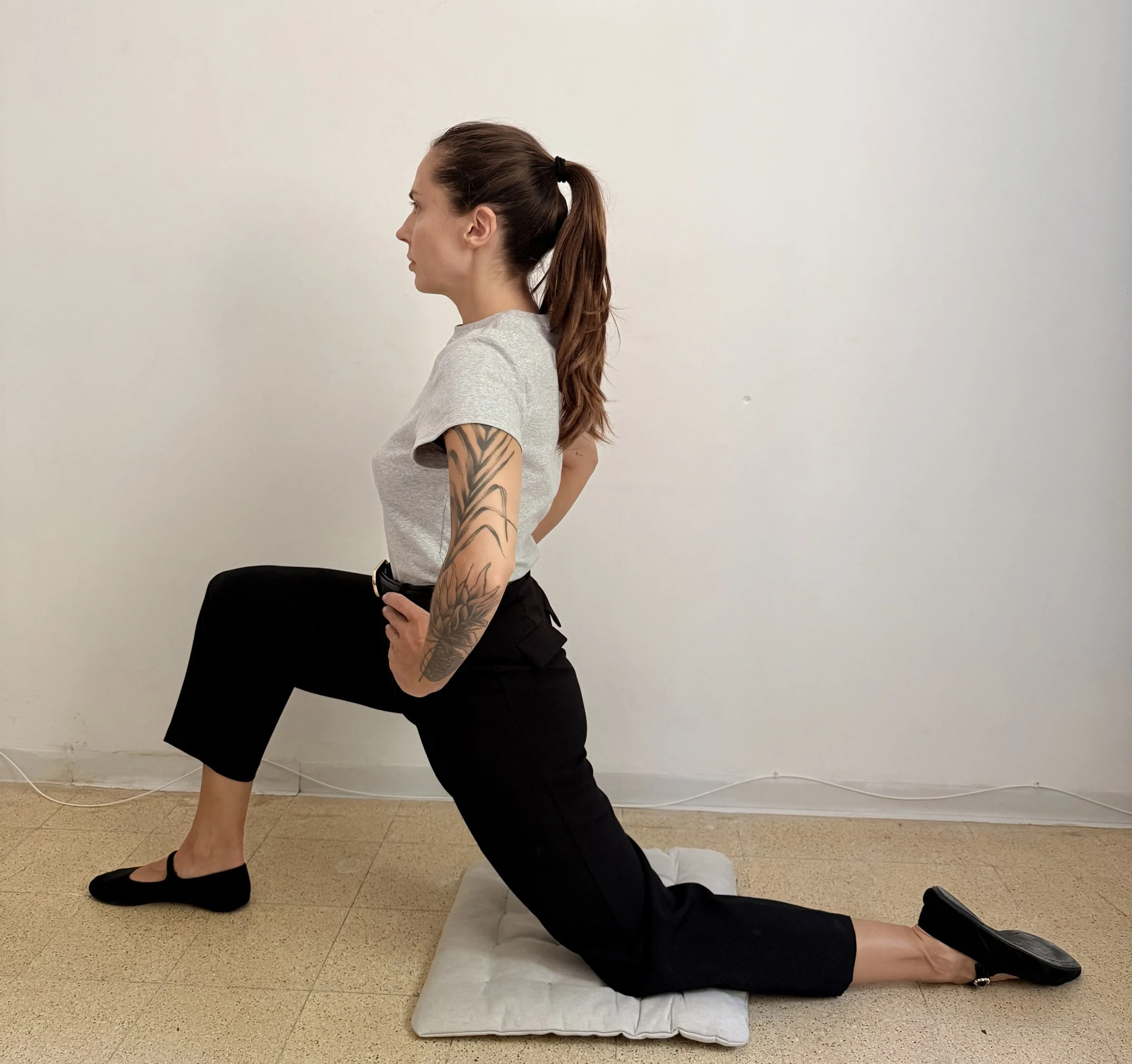 Half-kneeling hip flexor stretch