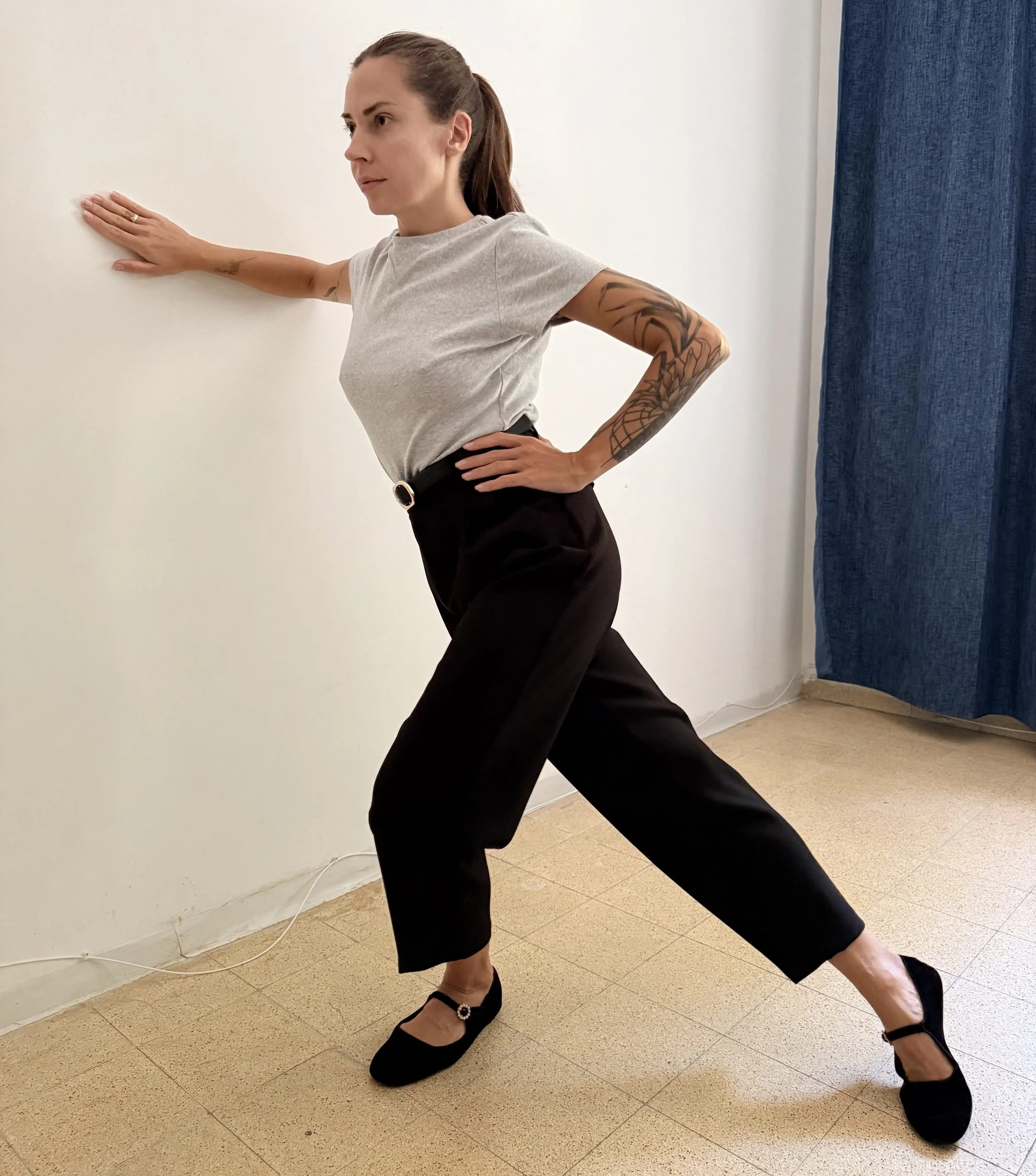 Hip stretch with a wall