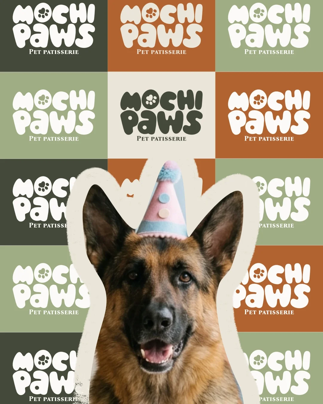 A German Shepherd dog wearing a pastel-colored party hat with dots, in front of a background featuring multiple 