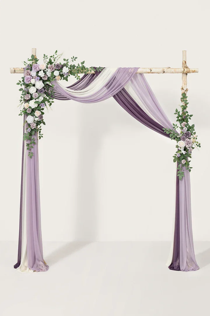 Flower arch with drapes in purple and cream