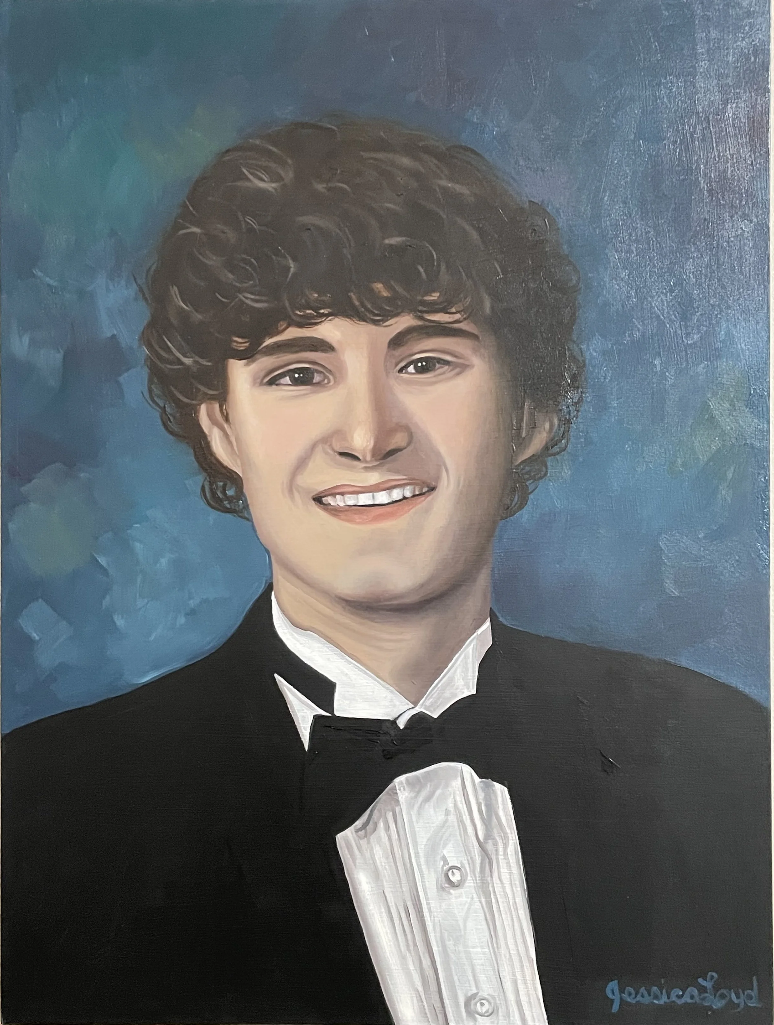 A senior portrait painting of a young man with curly hair, wearing a tuxedo and bow tie, smiling, against a blue background.