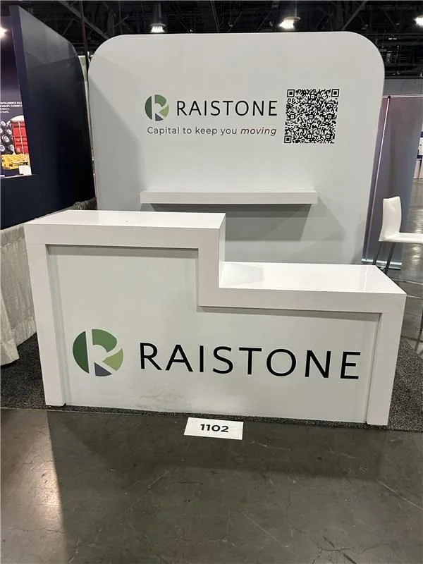 Raistone logo placement and design created for booth at Manifest 2025 event.