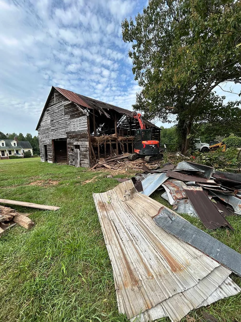 Old barn being taken down during demolition