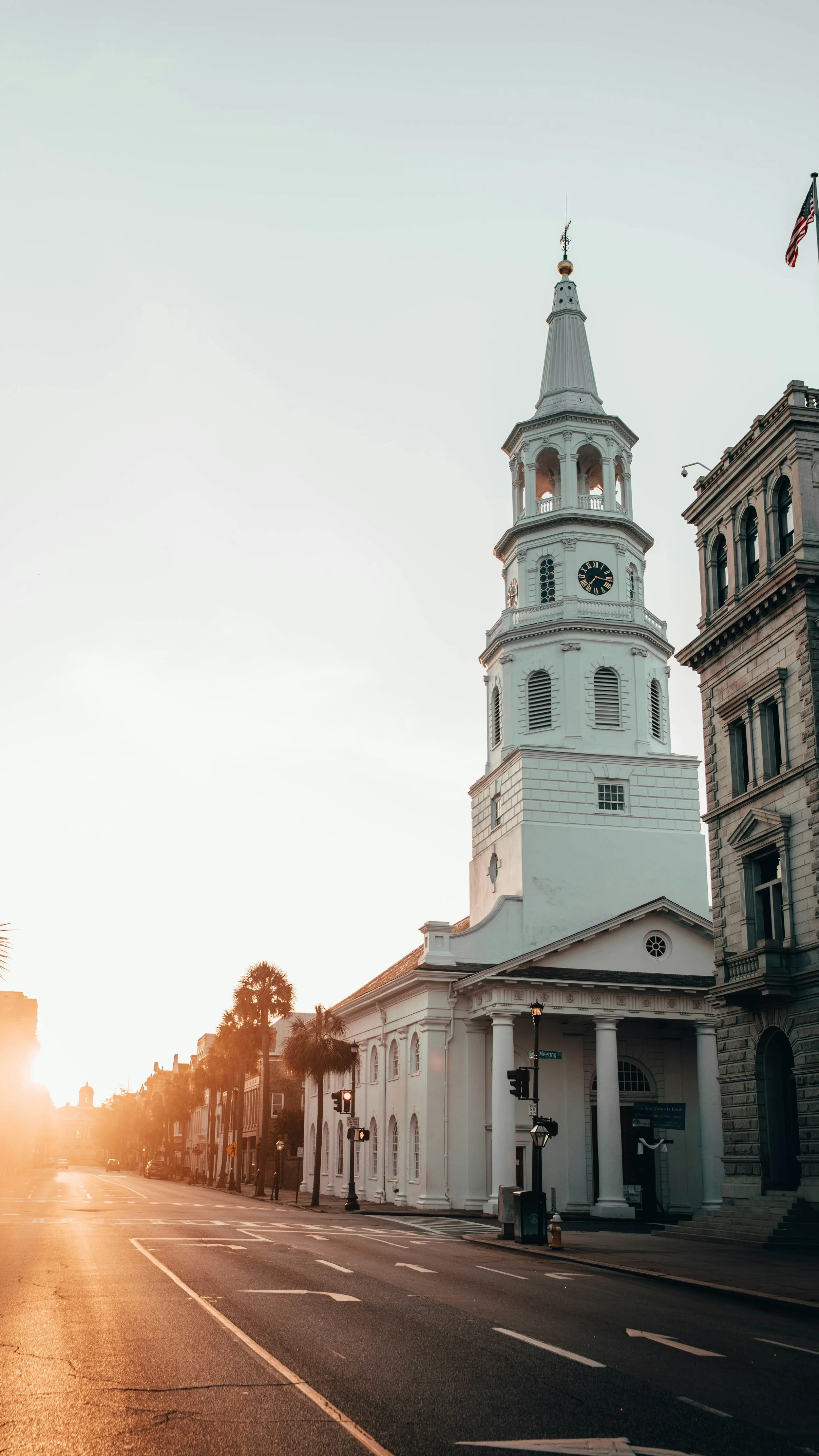 Sunrise over St. Michael’s Church on Broad Street in historic downtown Charleston, South Carolina
