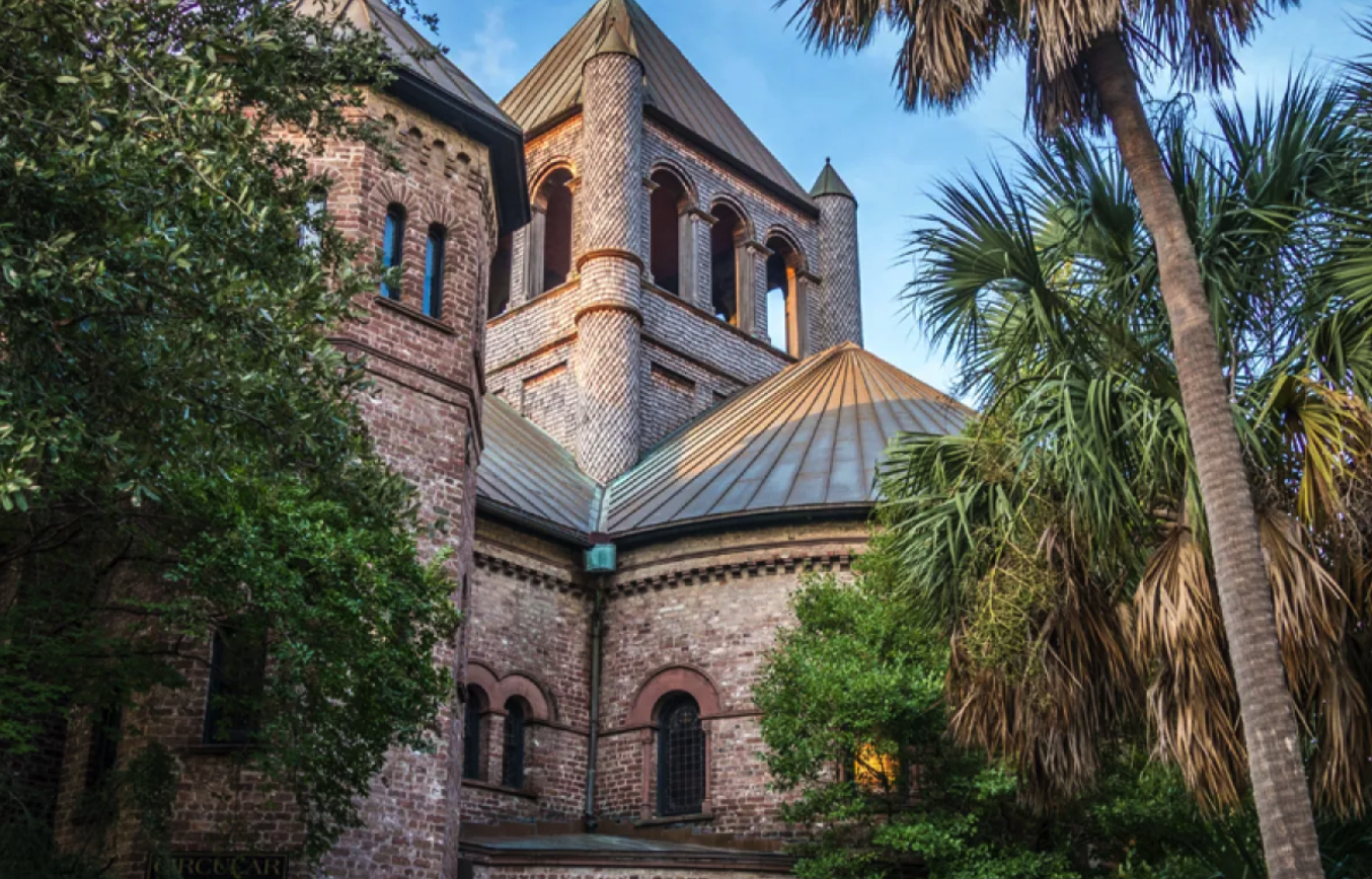 Historic Building with trees around it in Charleston, SC on historic walking tour