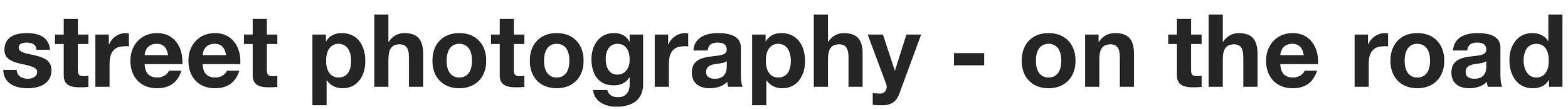 Text that reads 'street photography - on the road' in black font on a transparent background.