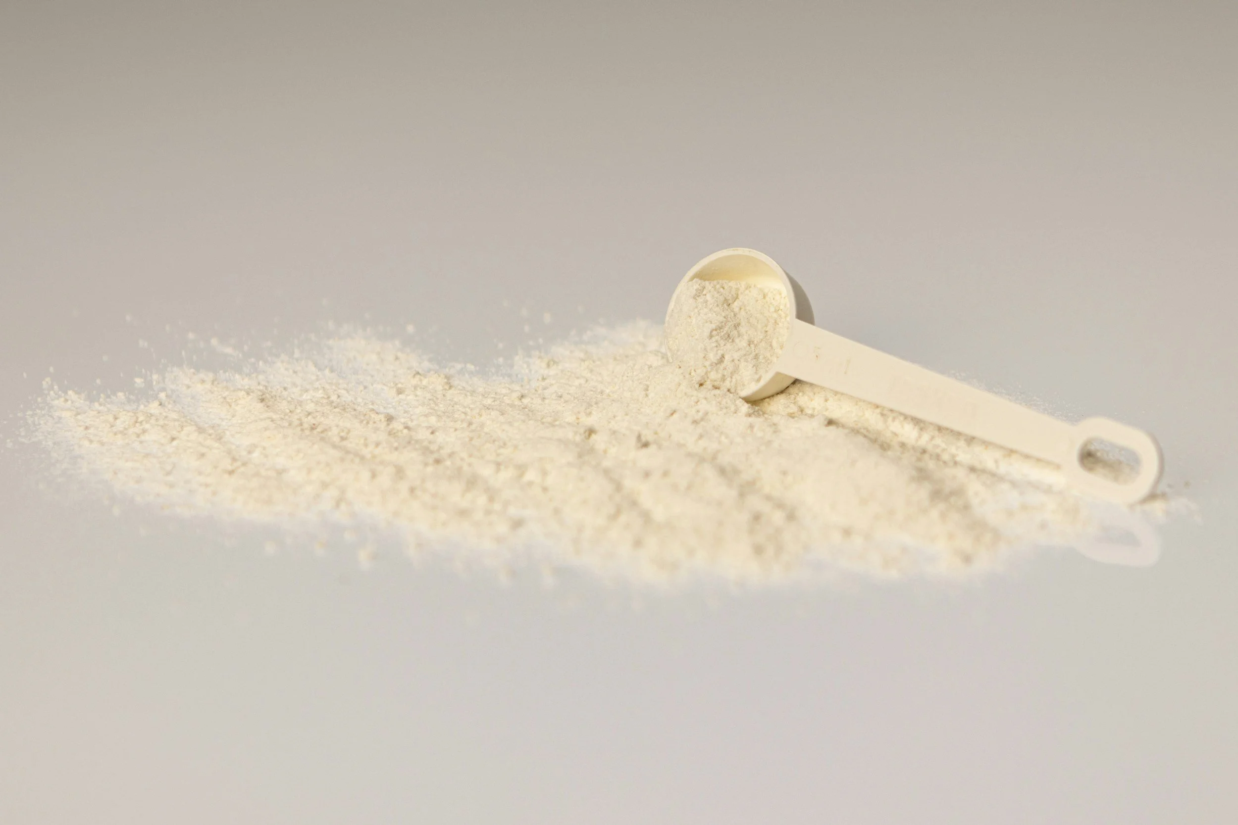 powder and a measuring spoon
