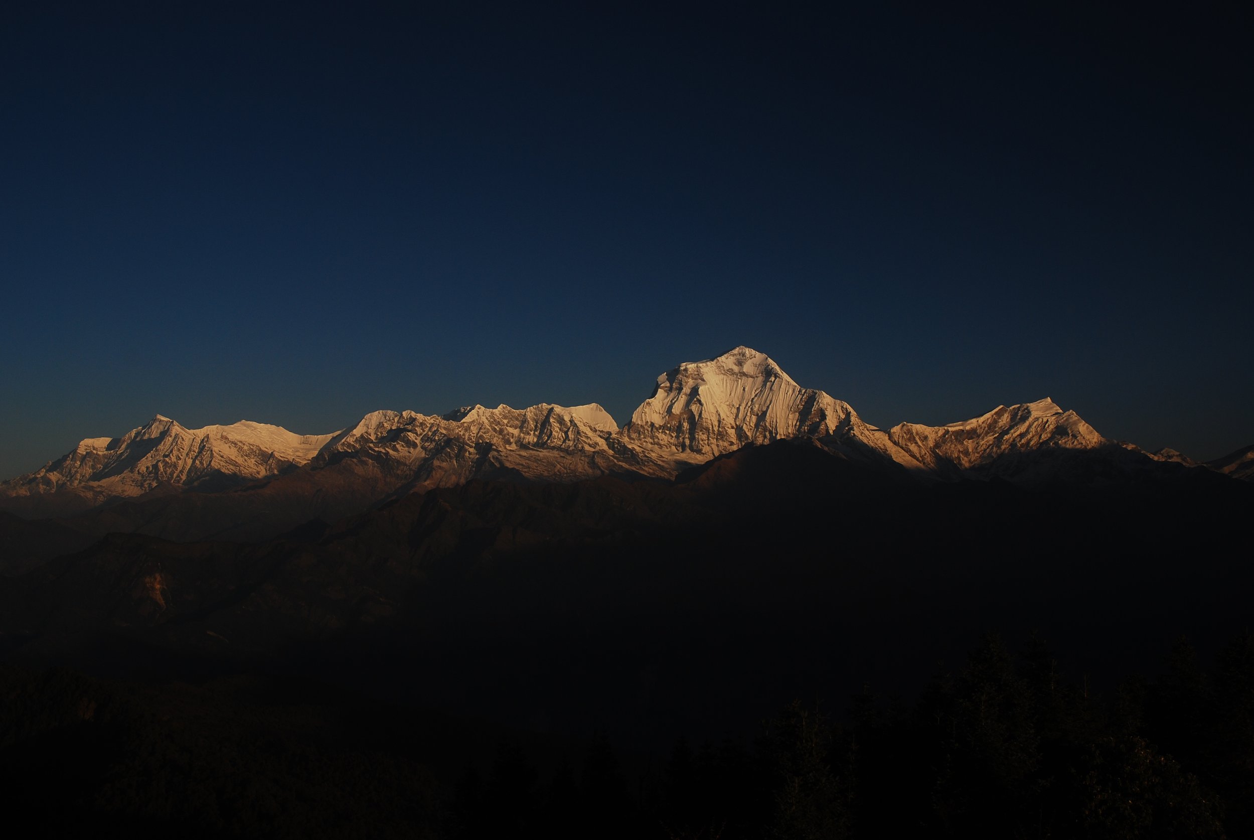 A sunrise view of the Annapurna mountain range from Poon Hill in Nepal