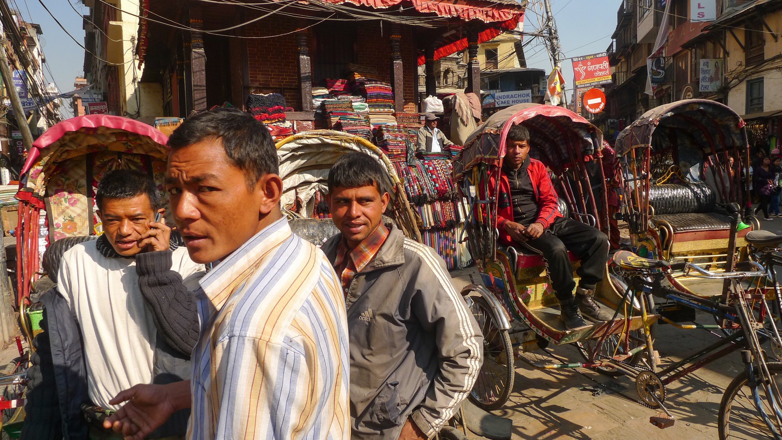 Richshaw riders in the streets of Kathmandu in Nepal