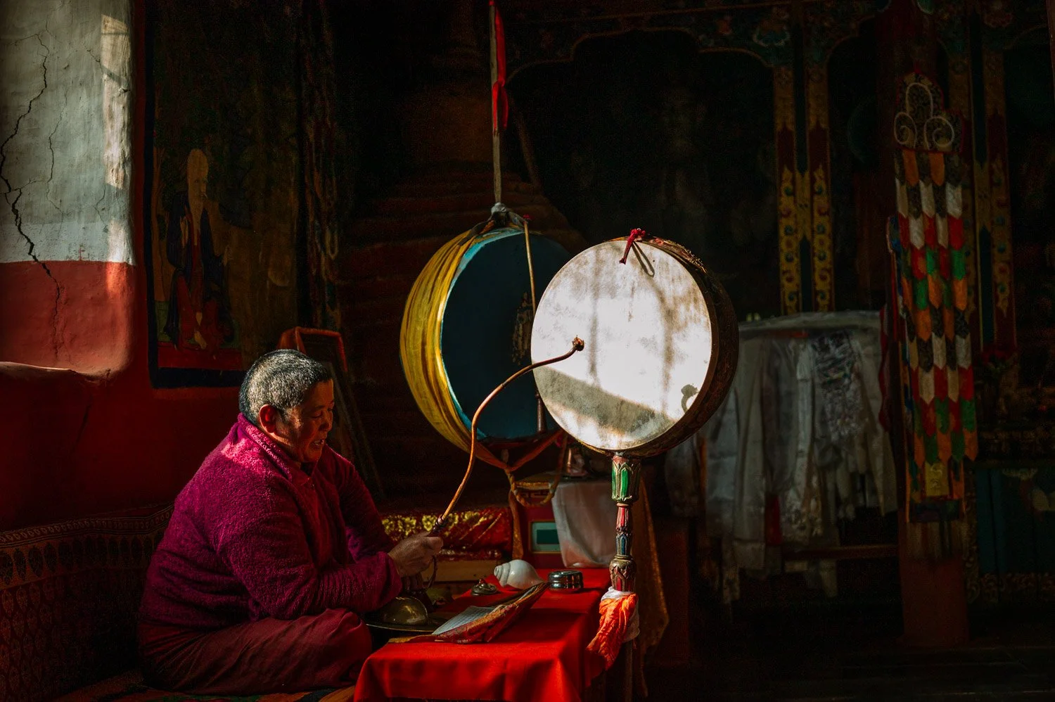 A nun chants in Sambha Gompa in Muktinath, Nepal