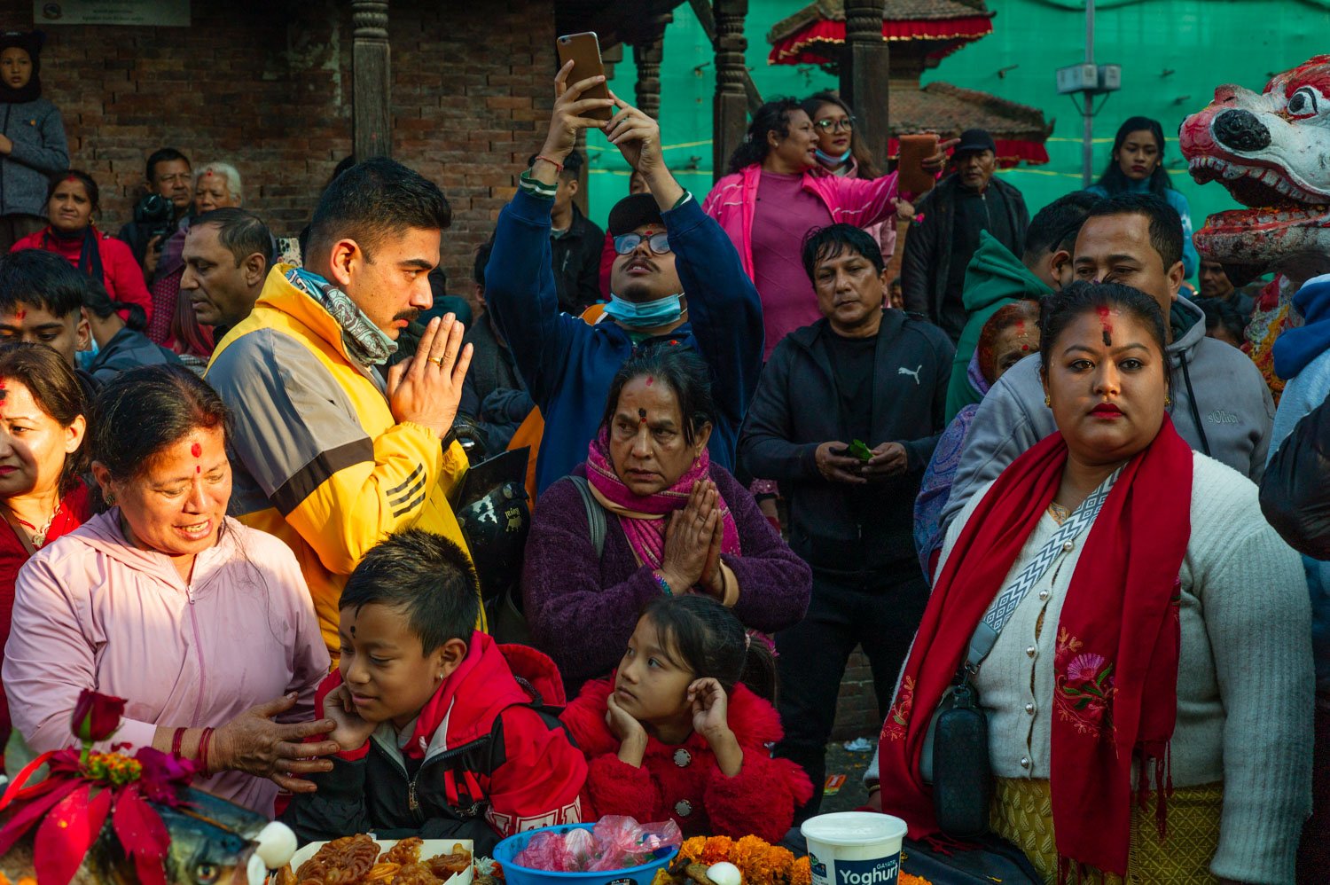 Visitors to temples at Kathmandu's Durbar Square during a festival