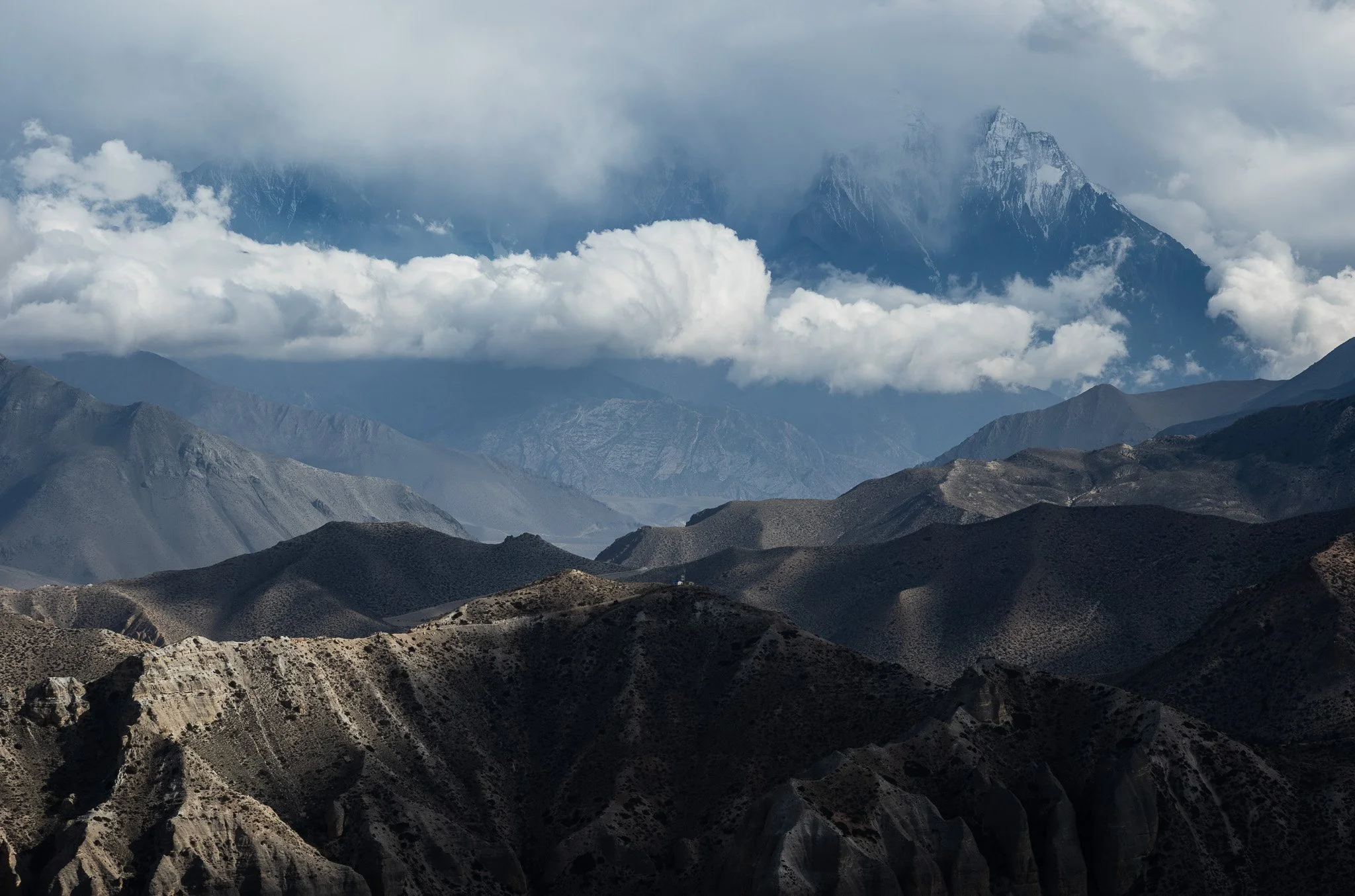 View of the Annapurnas on the road to Lo Manthang in Mustang