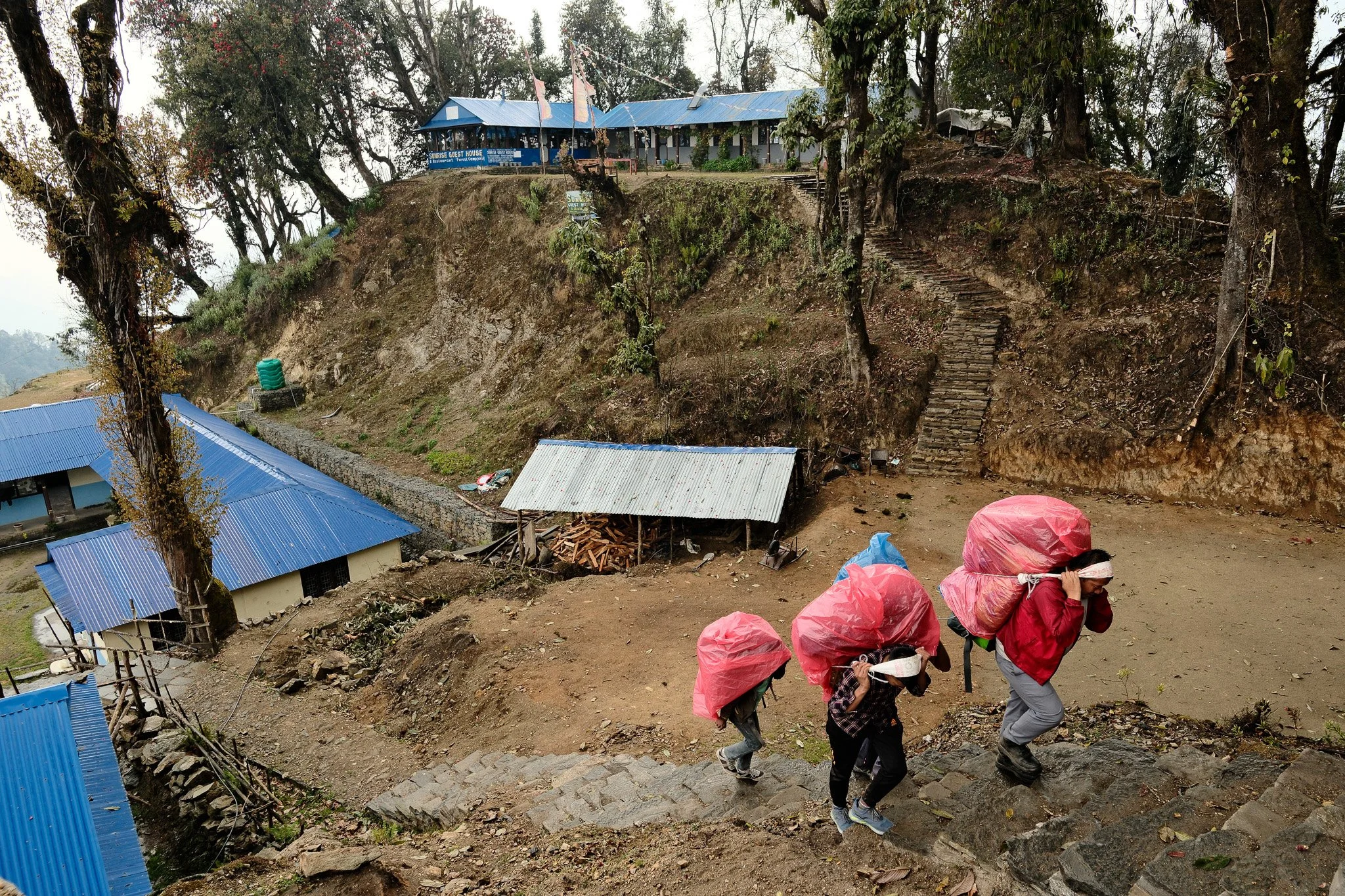 Three porters on the Mardi Himal trek