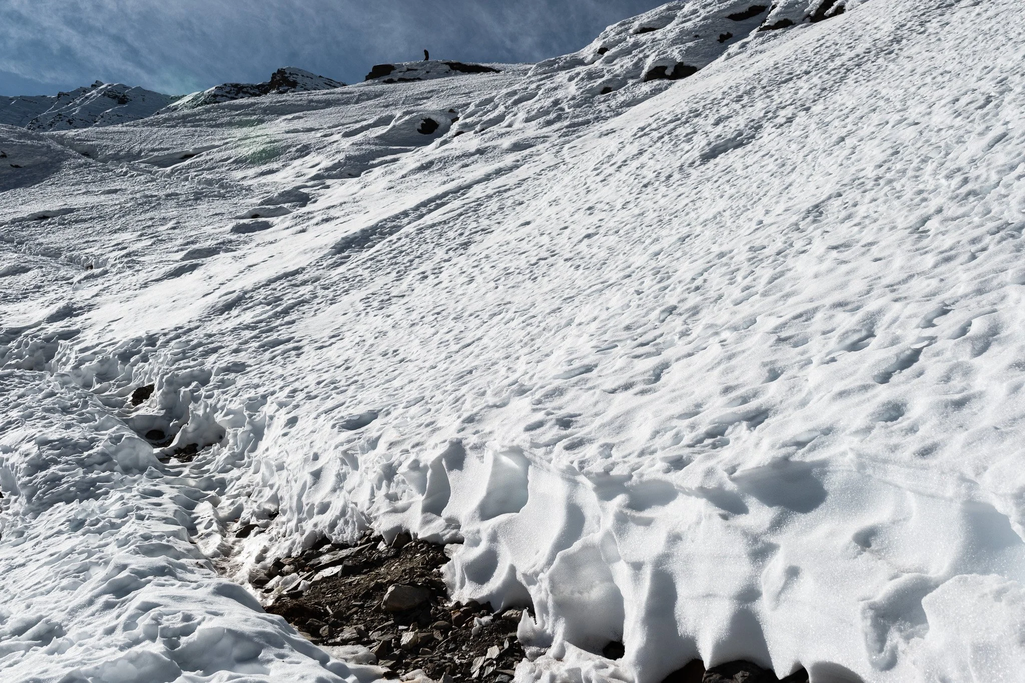 Ascending an icy trail towards Kang La pass in Nepal