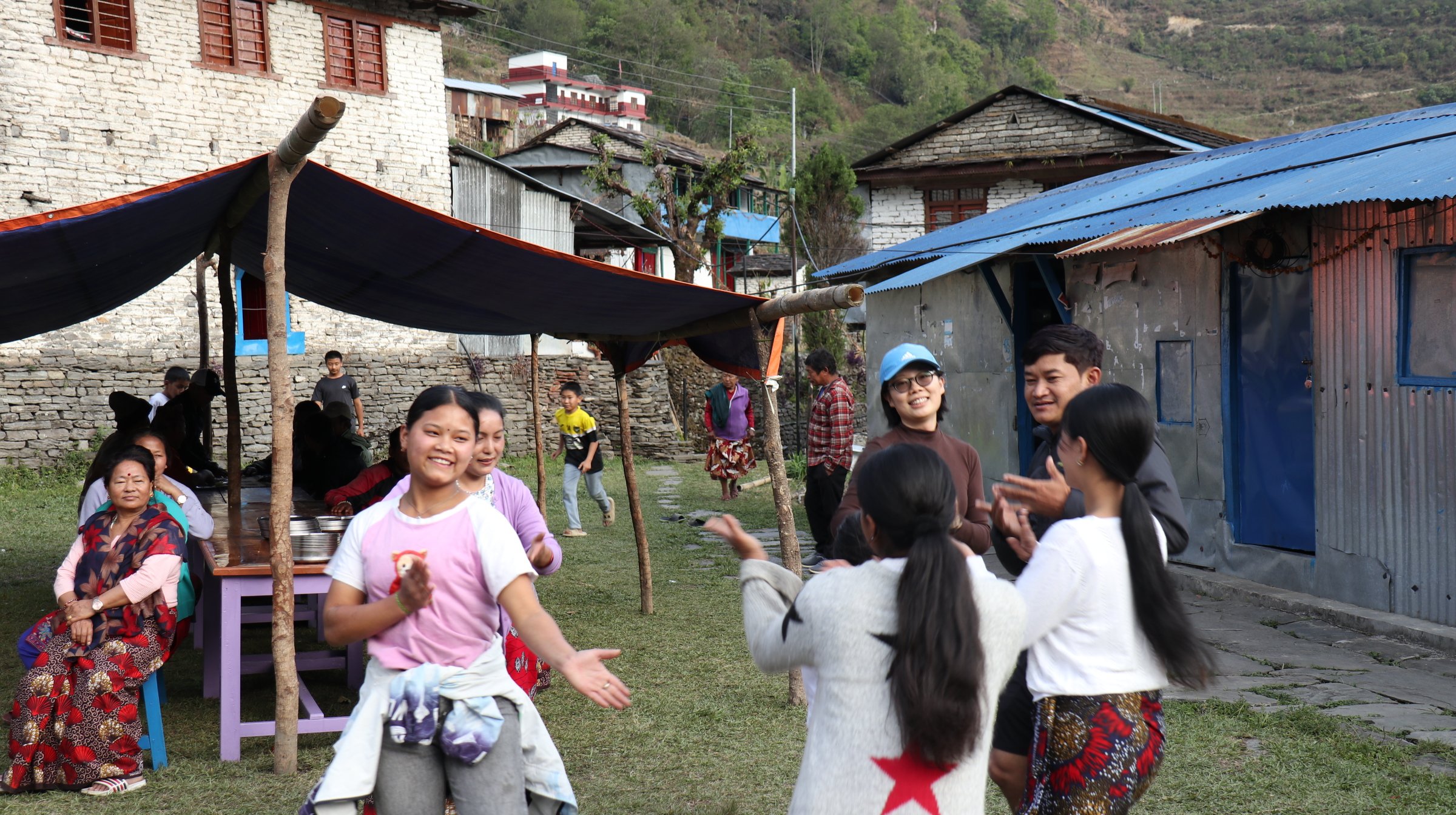 Villagers dancing near Poon Hill in Nepal