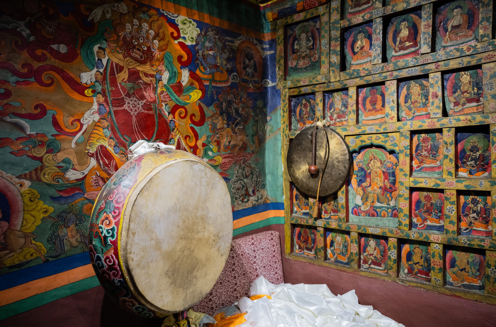 Ceremonial musical instruments hang in a chapel in Ghar gompa in Mustang